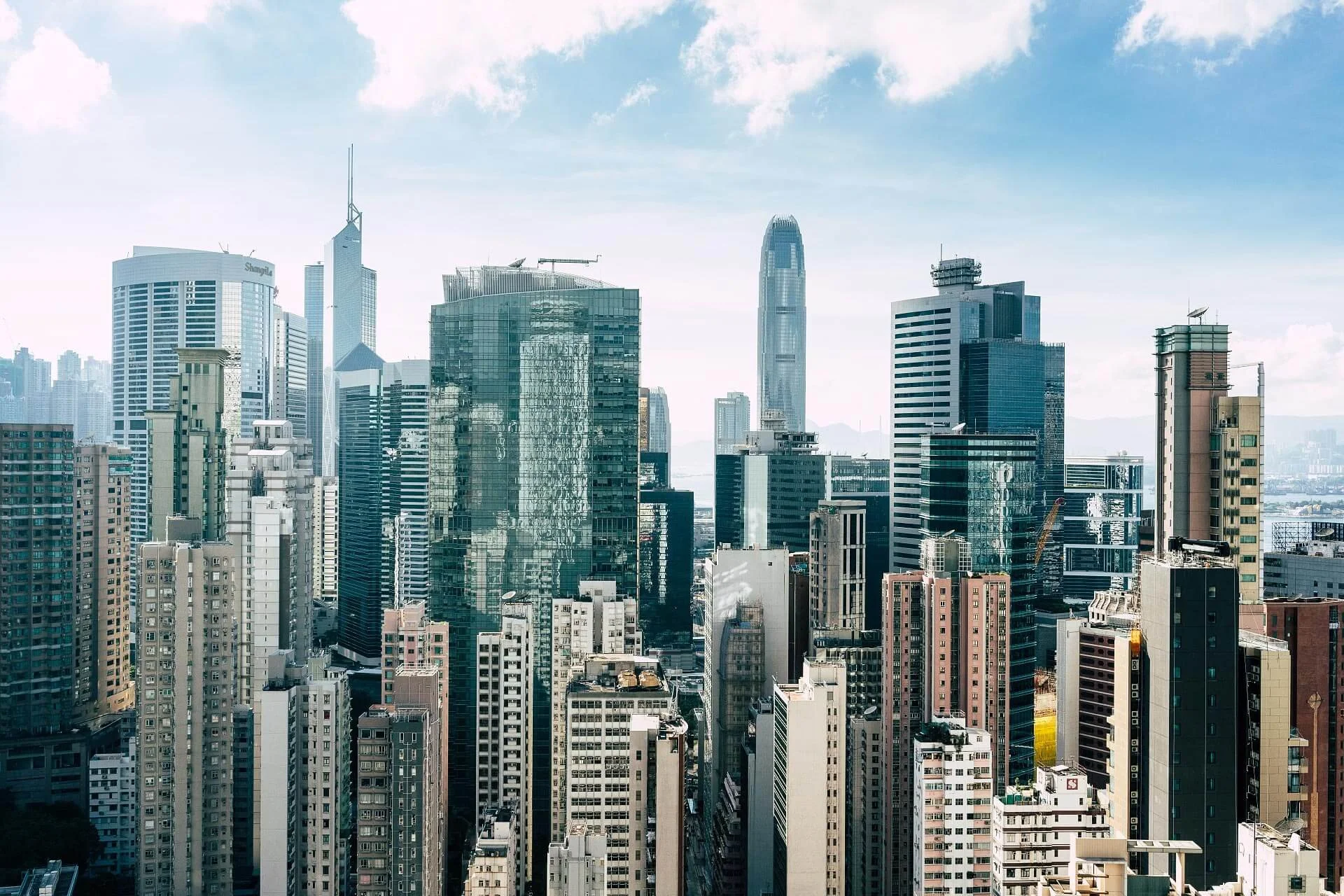 Modern skyscrapers in daylight with distinctive structure – photo by Milan Istvan