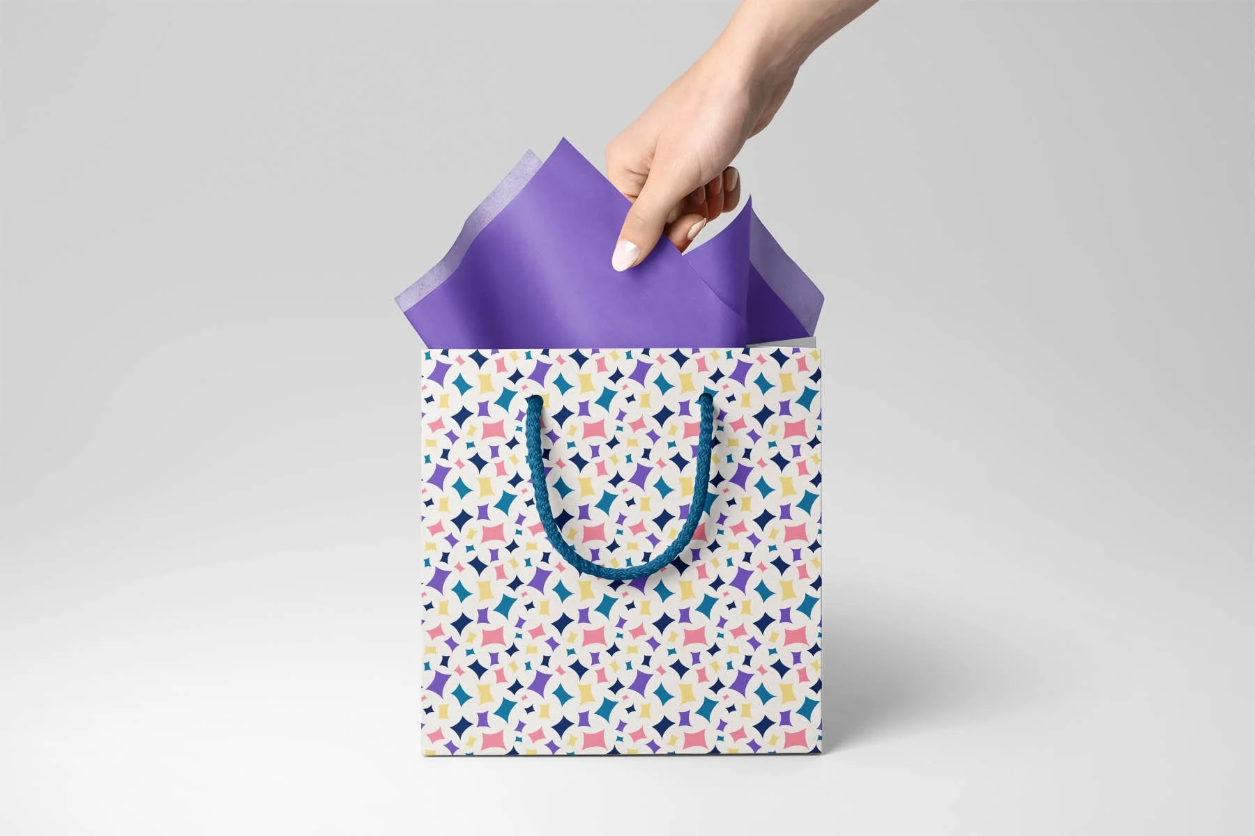 Gift bag mockup - click the photo to find it on Creatsy.com.