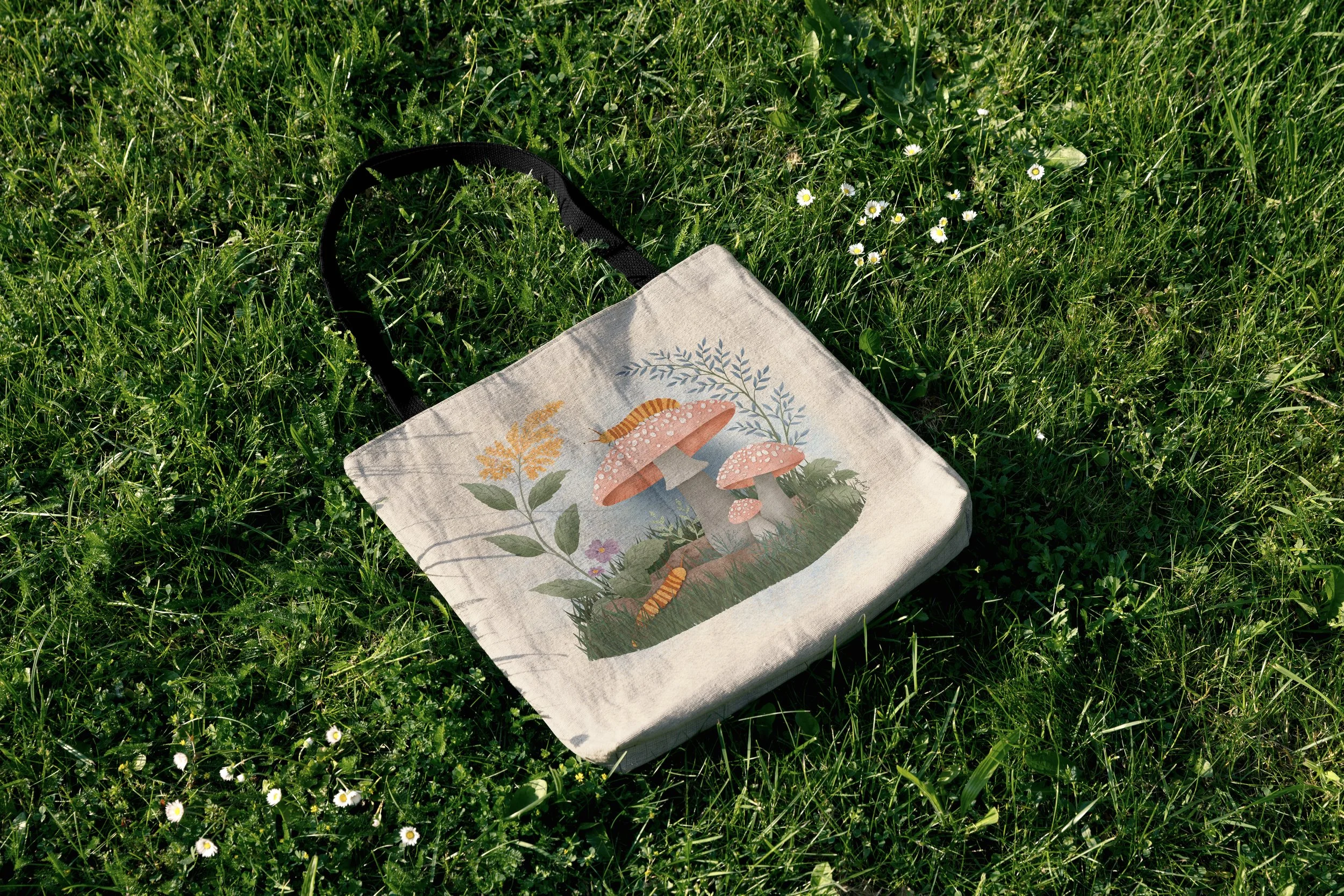 tote bag in grass caterillar.jpg