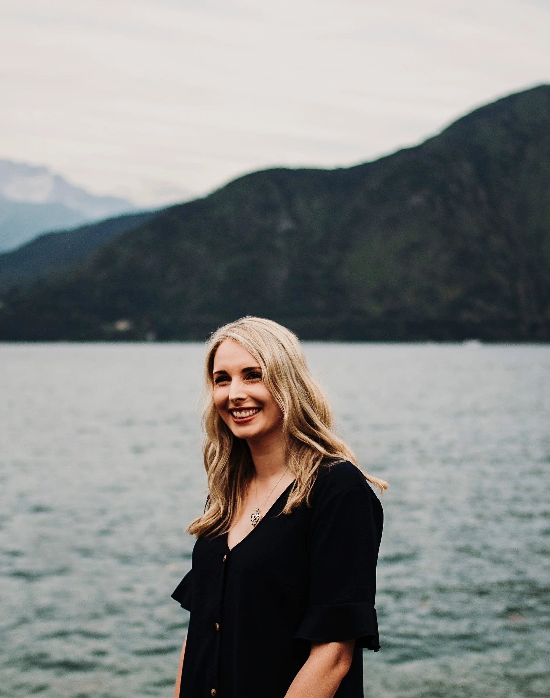 Profile image of Corinne at a lakeside location