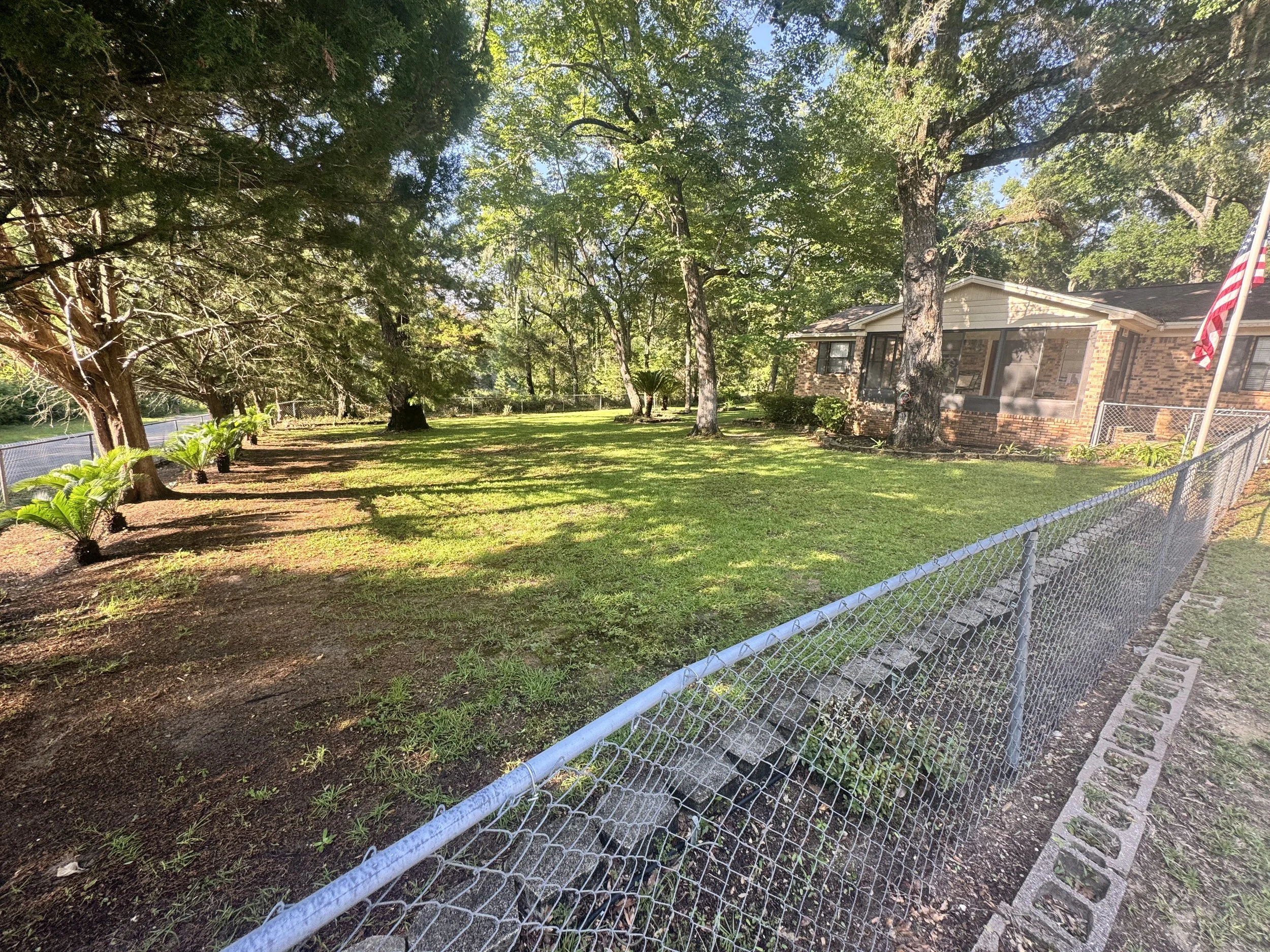 Acreage lawn mowing on a Freeport, FL property