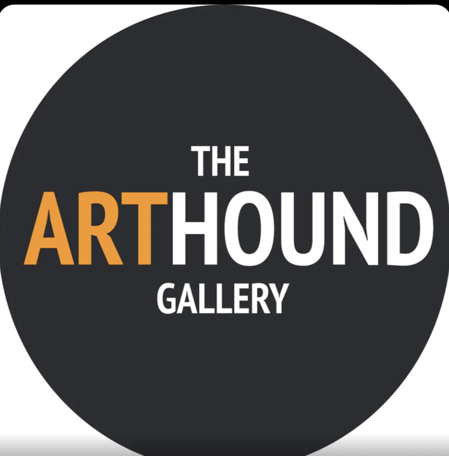 Logo of The Art Hound Gallery with a black circular background and white and orange text.