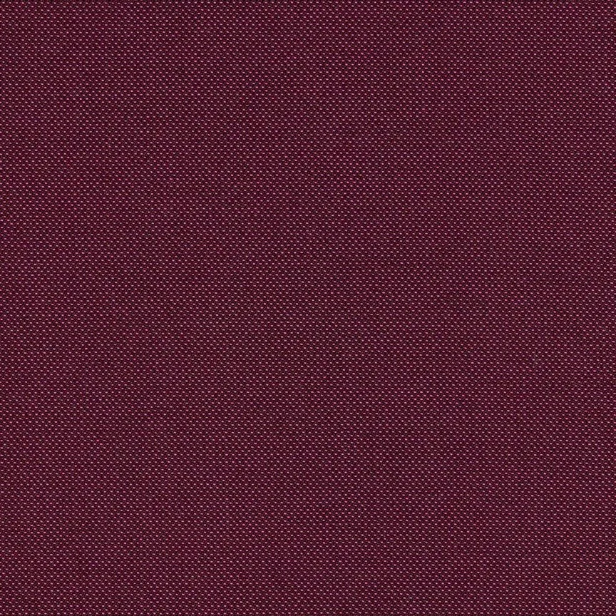 Close-up of a textured, dark red fabric with tiny white dots evenly spaced.