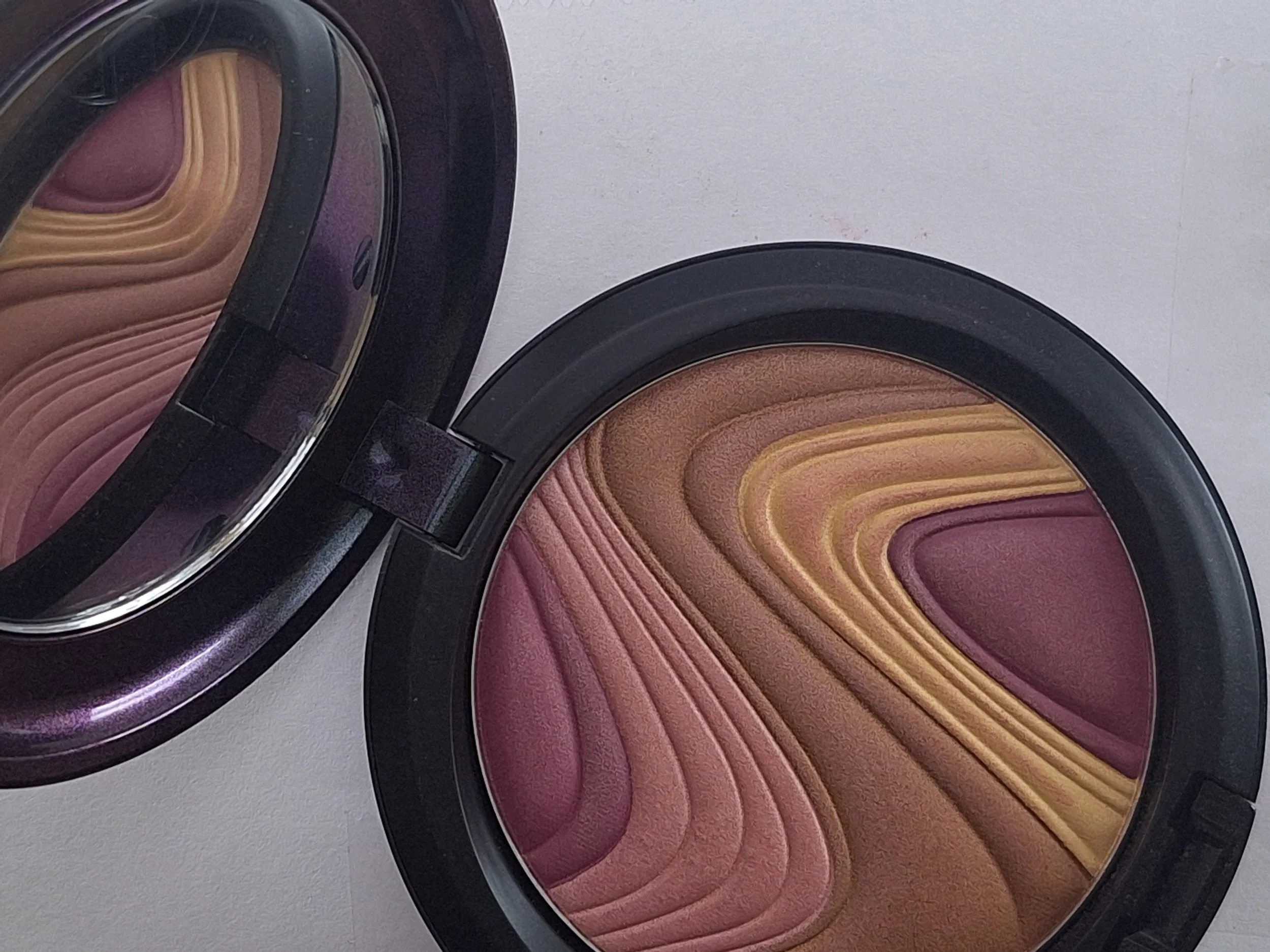 M·A·C Mirage Noir Collection Mother O’ Pearl Pearlmate, Golden Rinse Bronzer, and Suntan and Repeat Eyeshadow in Sparkle Society XO vault