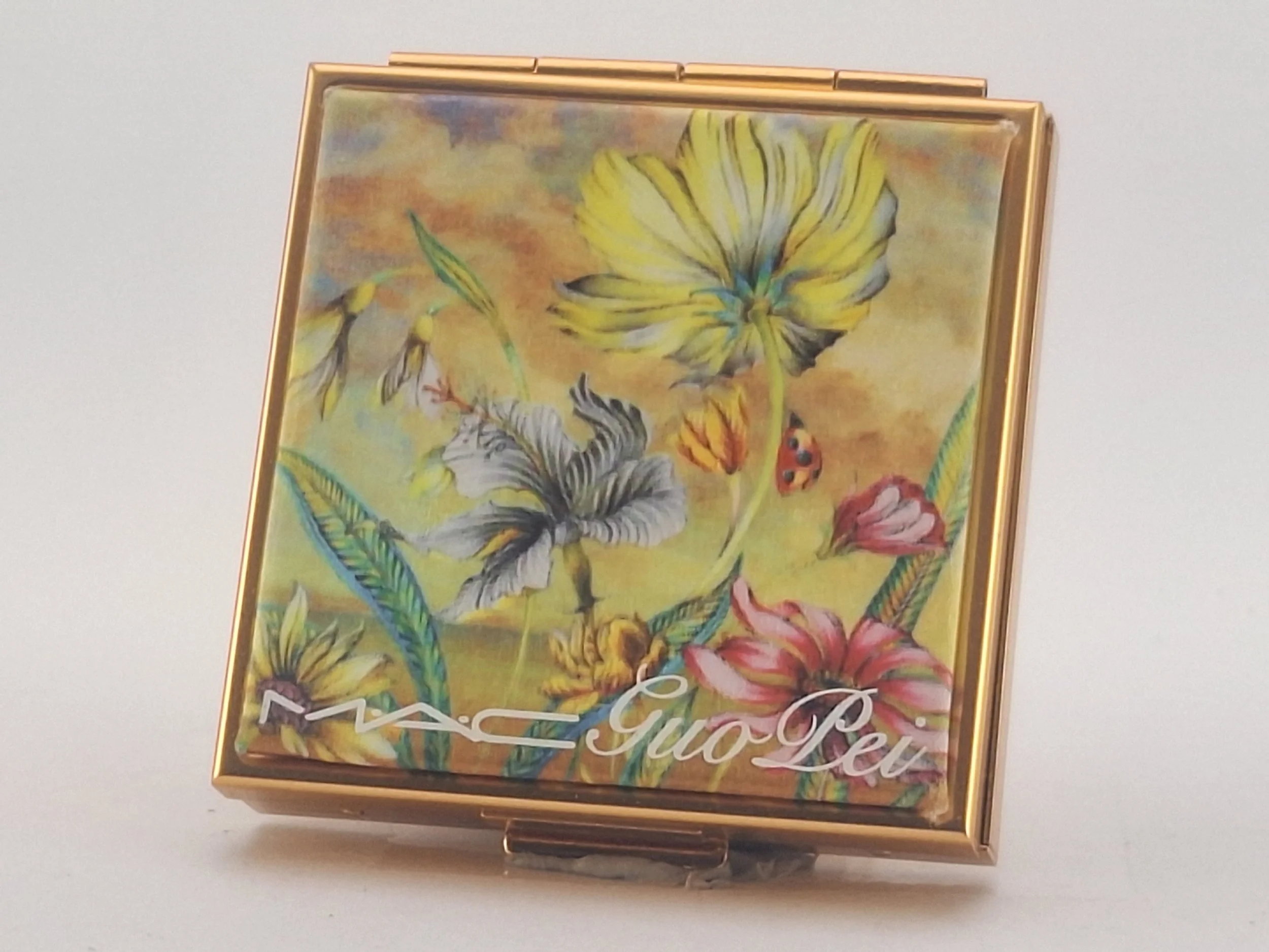 M·A·C x Guo Pei collection display featuring verified Sparkle Society XO items