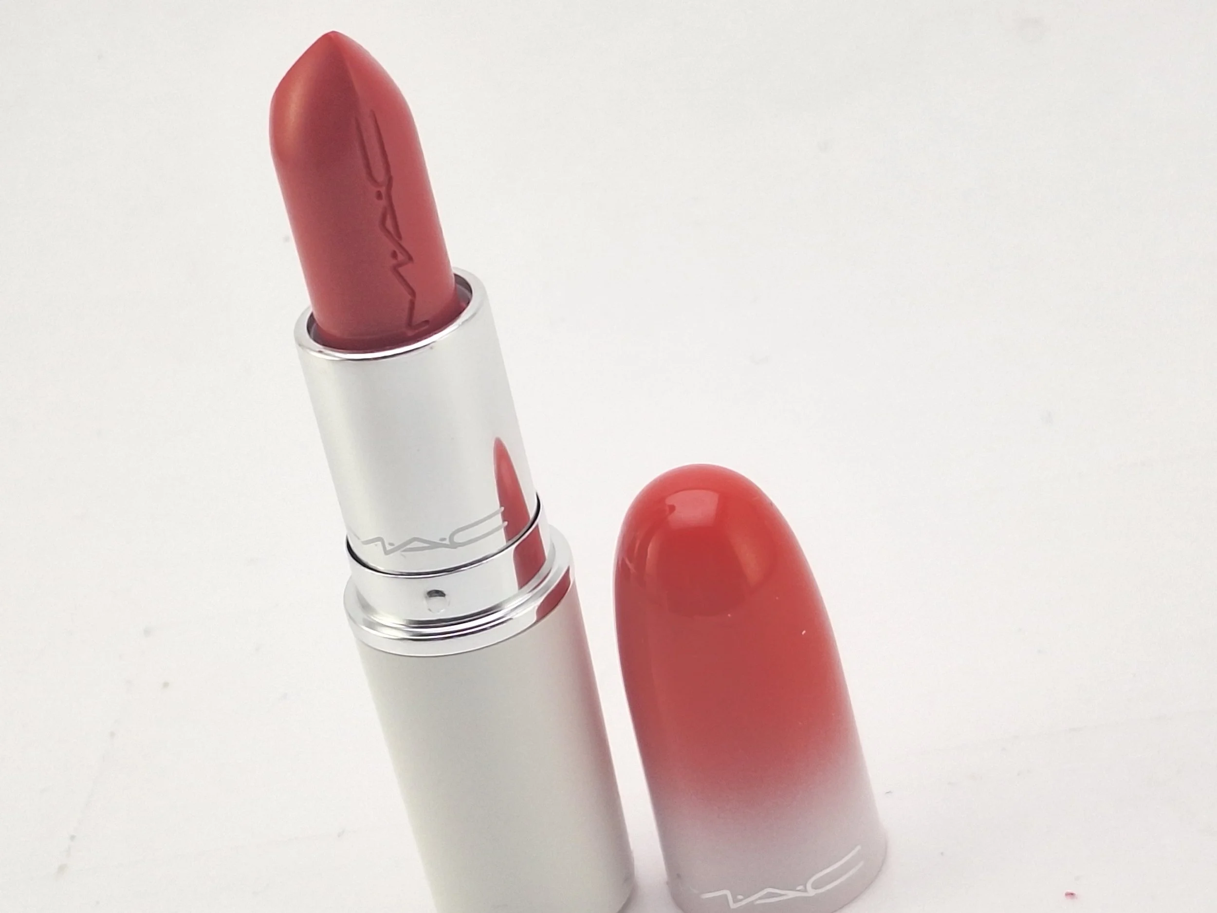 Detailed close-up of a M·A·C lipstick from the Bizarre Blizzard Bash Holiday 2023 collection highlighting the seasonal design and finish.