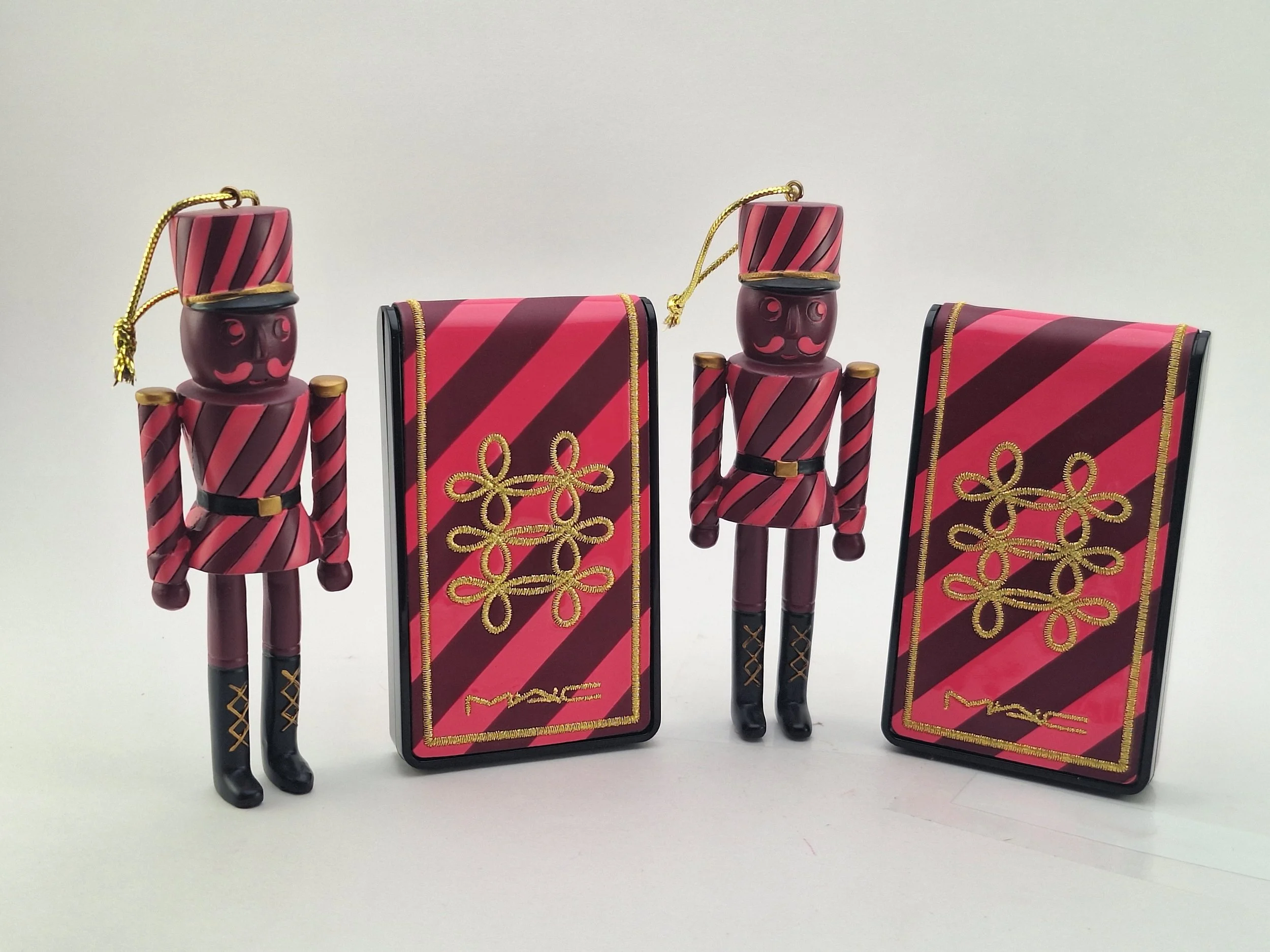 Close-up of Nutcracker Sweet star-embossed blush and luxurious holiday packaging