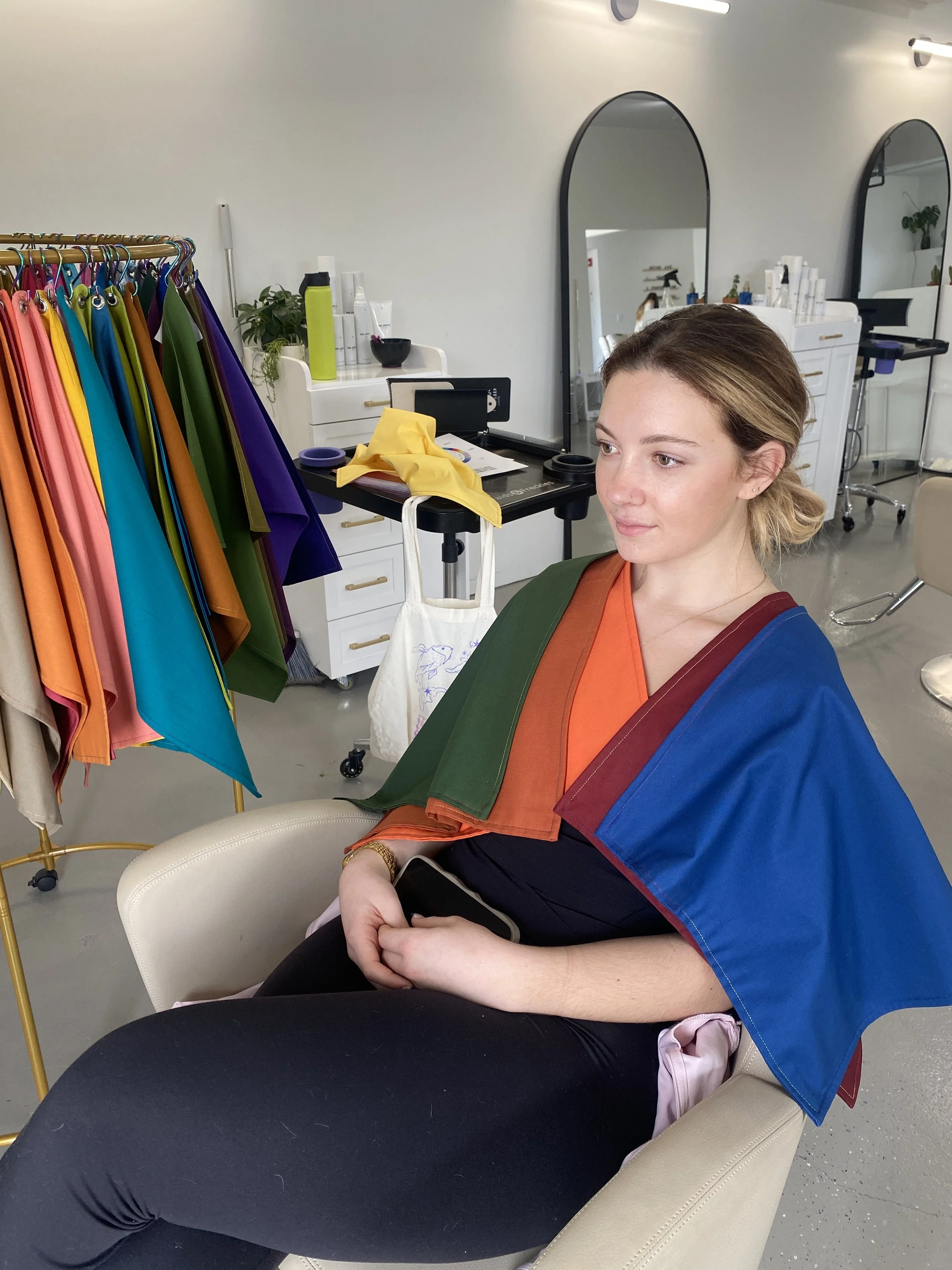 Allie from ŌRA Beauty in Middletown Rhode Island getting a color analysis done by Beth of Chromalune