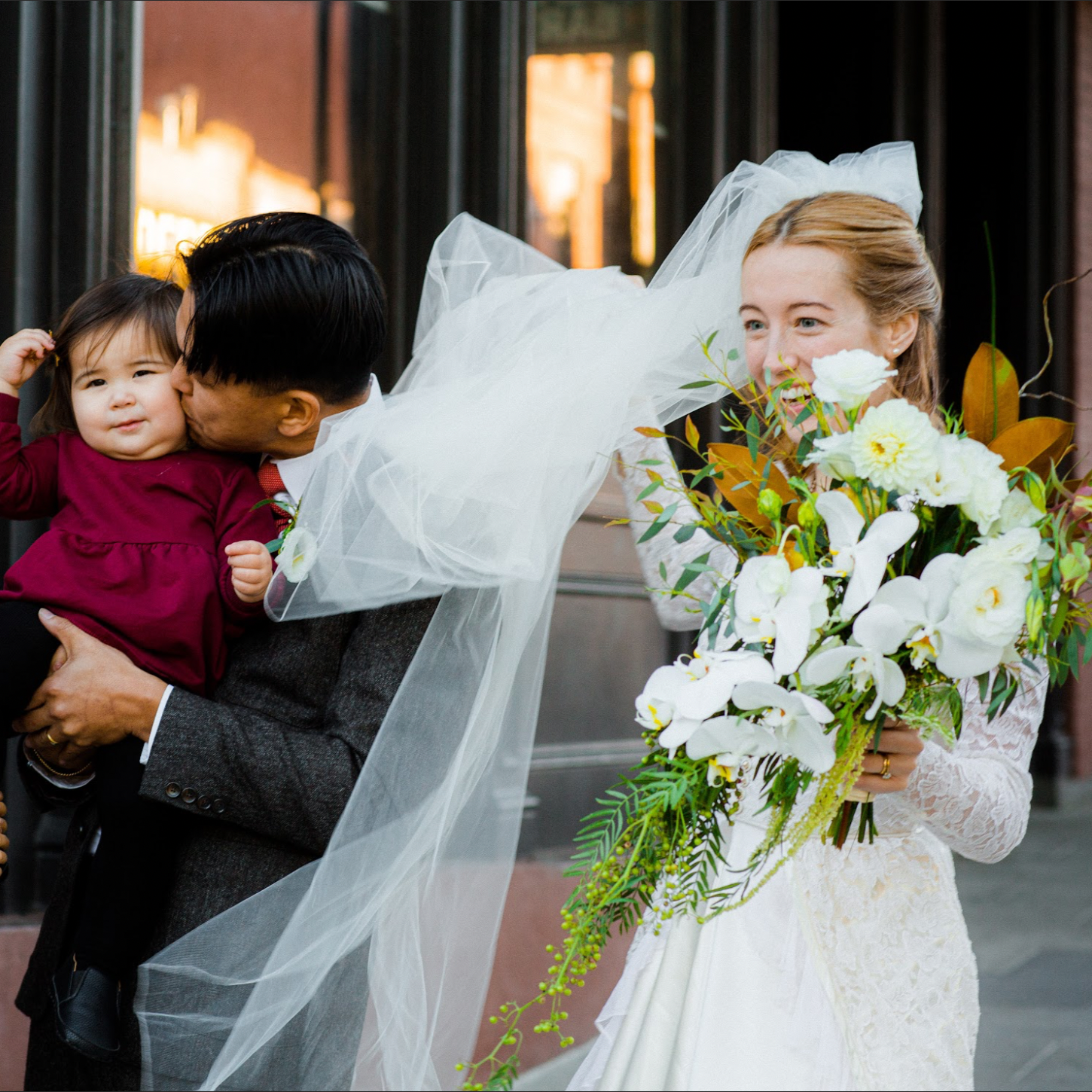 Bride with bouquet by Golden Flowers