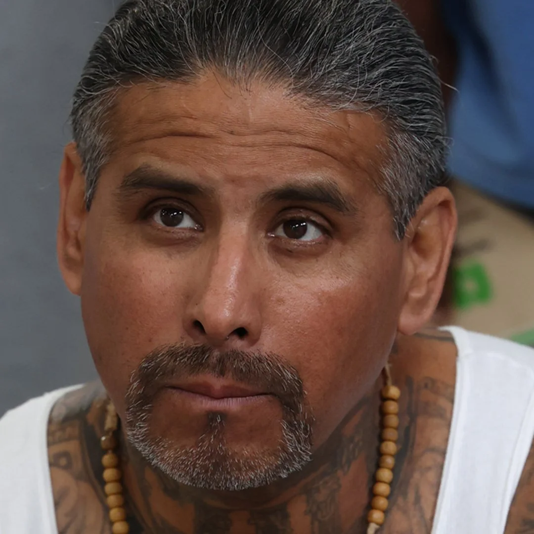 A hispanic male reformed prison inmate in the USA partaking in a charity event Pickleball in prisons