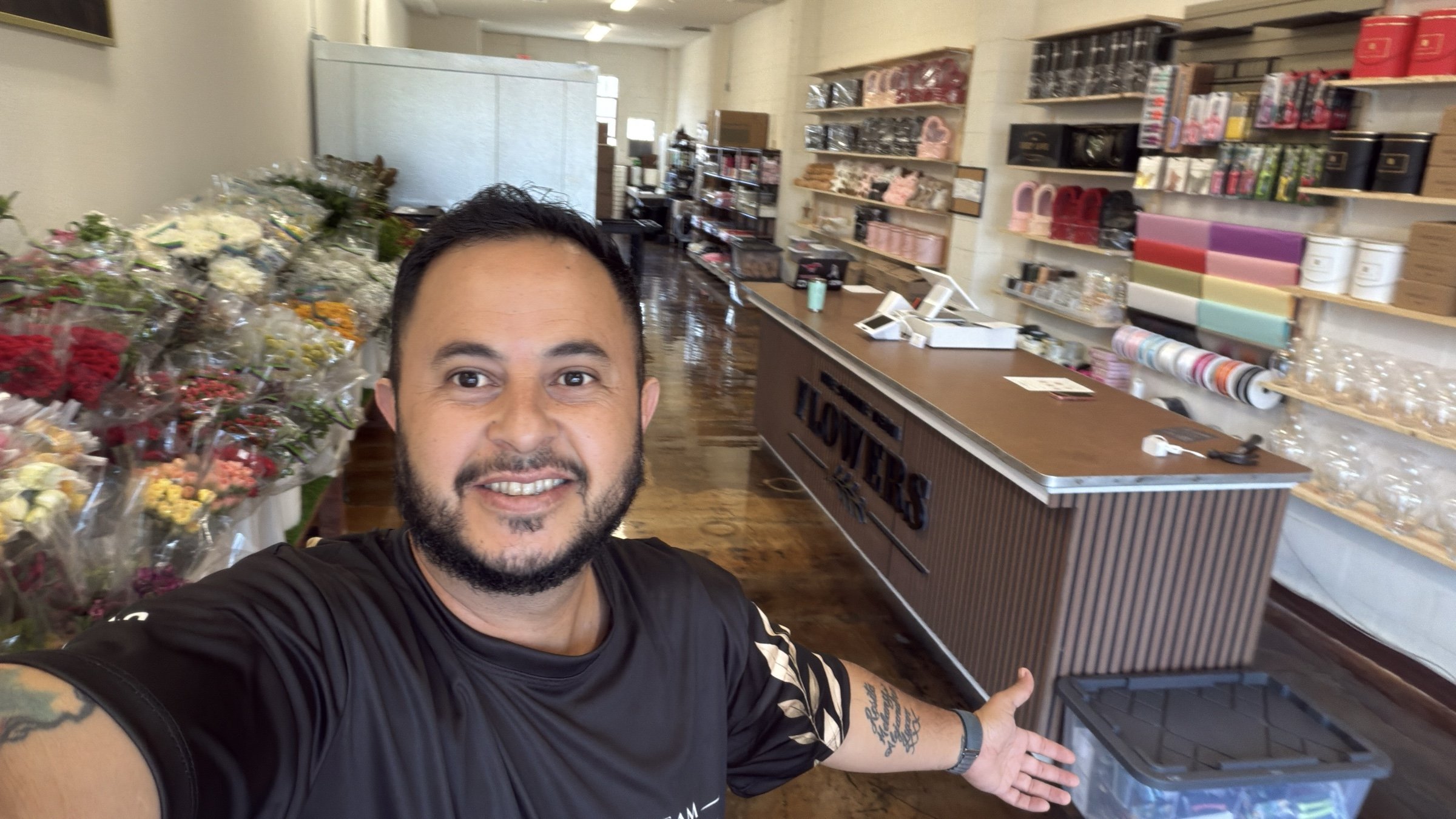 A welcoming portrait inside The Strike Team Flowers shop, with fresh flowers and stocked supplies in Concord.