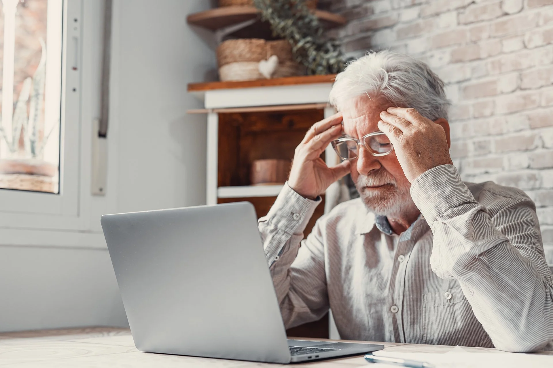 An older white man who looks frustrated and tired due to a lack of sleep