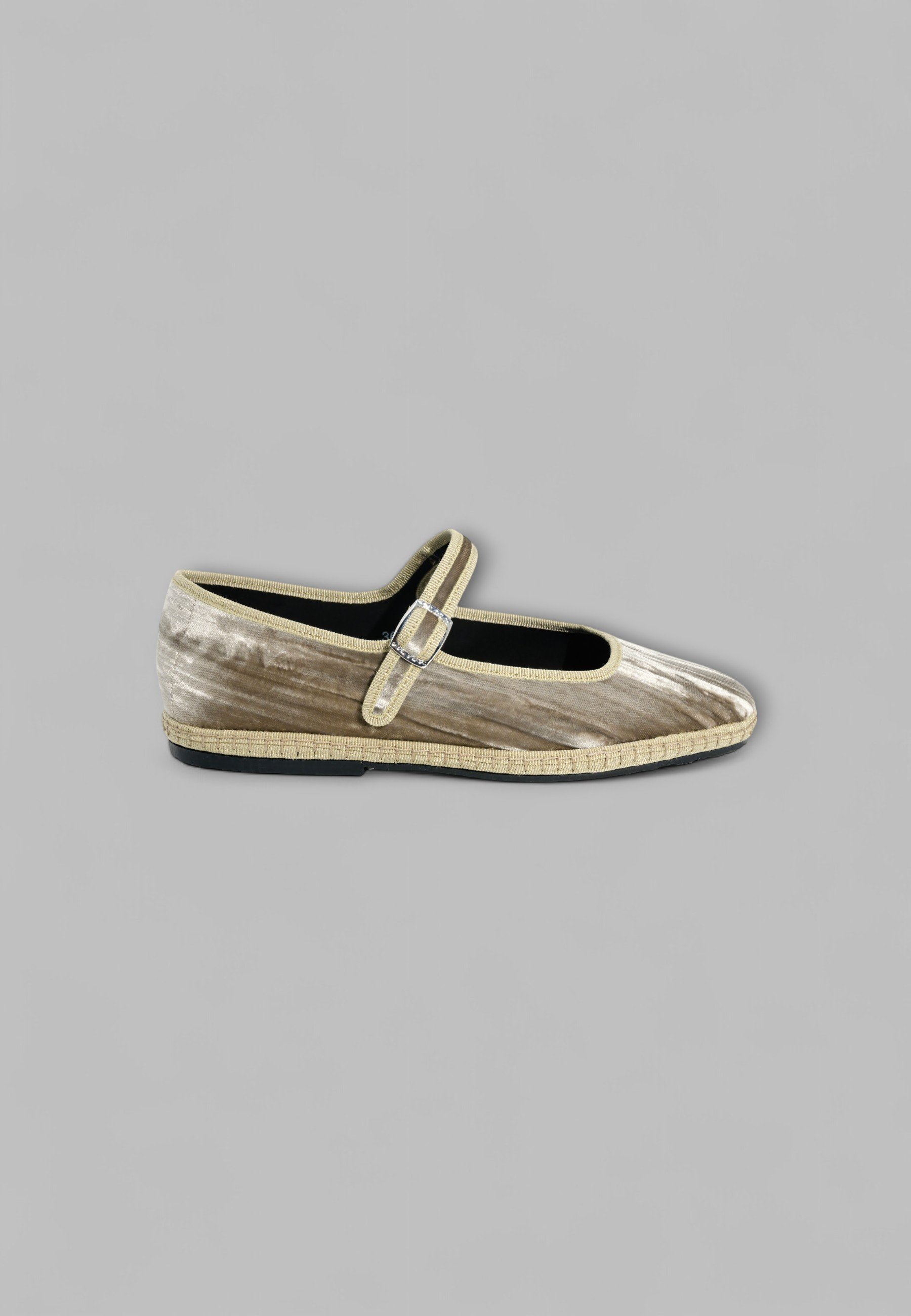 Single Champagne velvet Mary Jane shown from the side with grosgrain and buckle