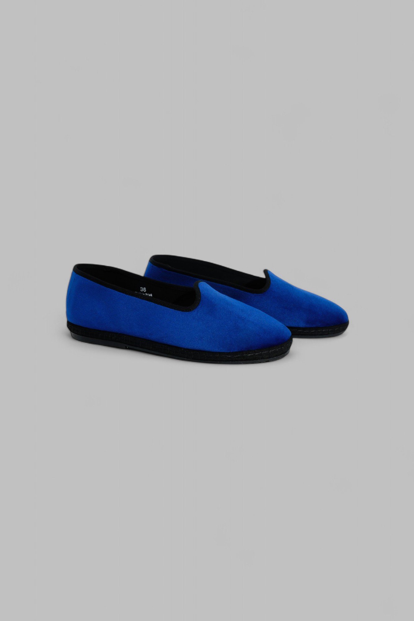 Side view of Gioia Royale velvet slippers shown as a pair