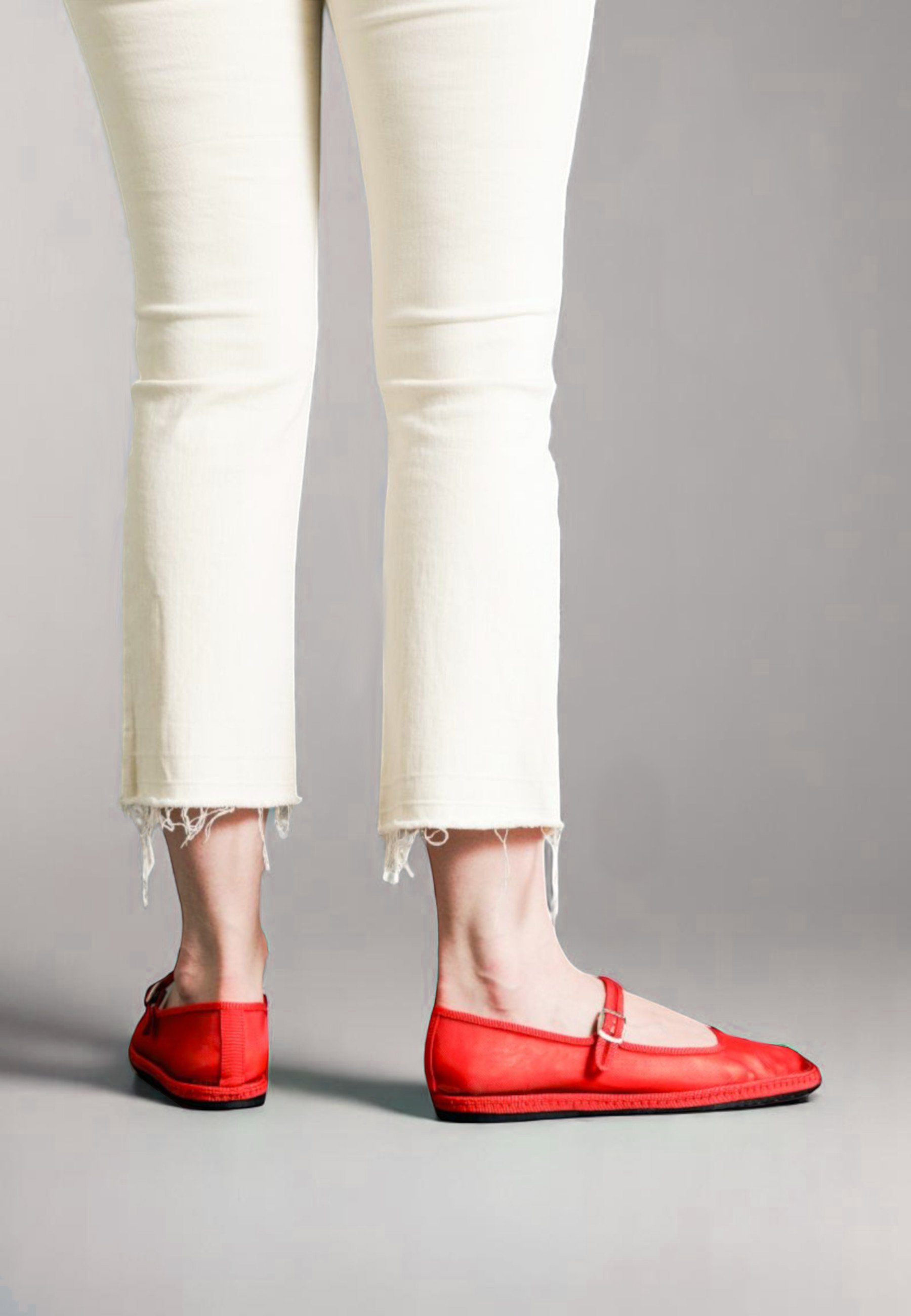 Back view of Flame red Aria slippers, square toe silhouette from behind