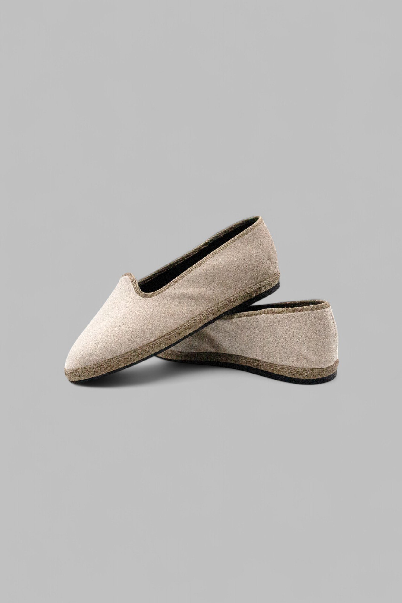Overlapping pair view of Gioia Dunes vegan suede slippers