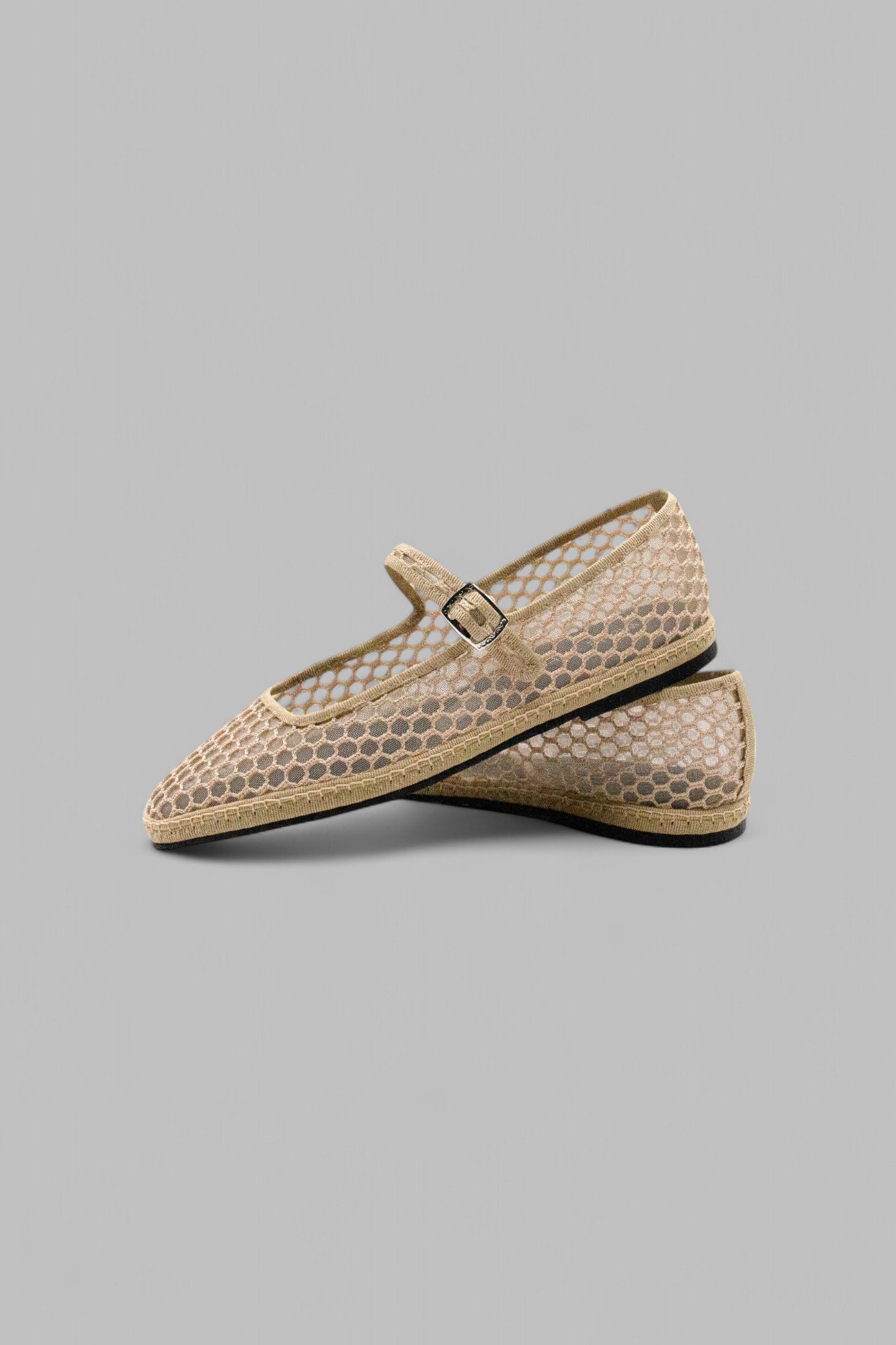 Overlapped pair of Aria Nude Net mesh Mary Jane slippers