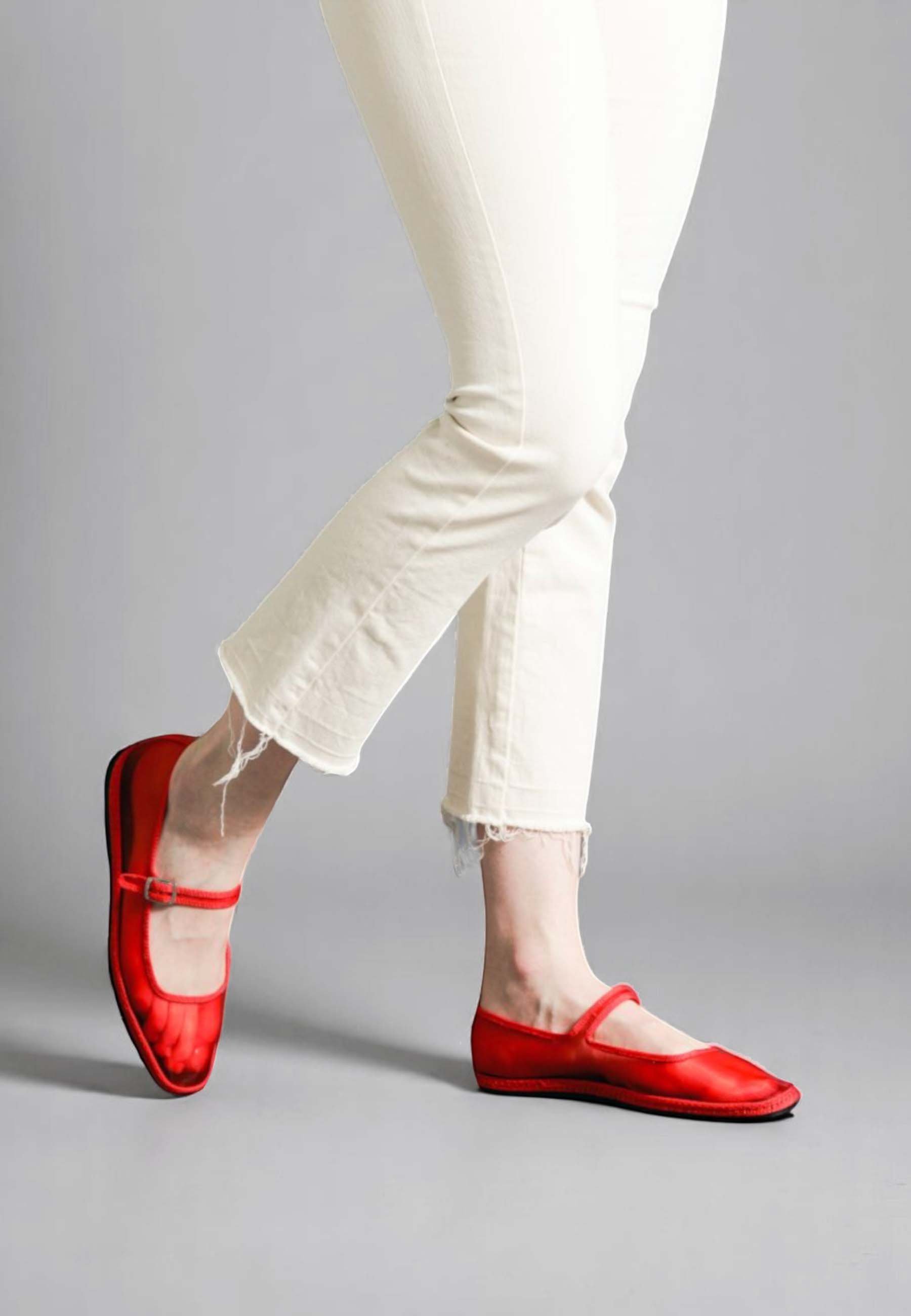 Walking view of Flame Aria Mary Janes, strap and honeycomb mesh detail in motion showcasing comfort and trend merging in one pair of slippers.