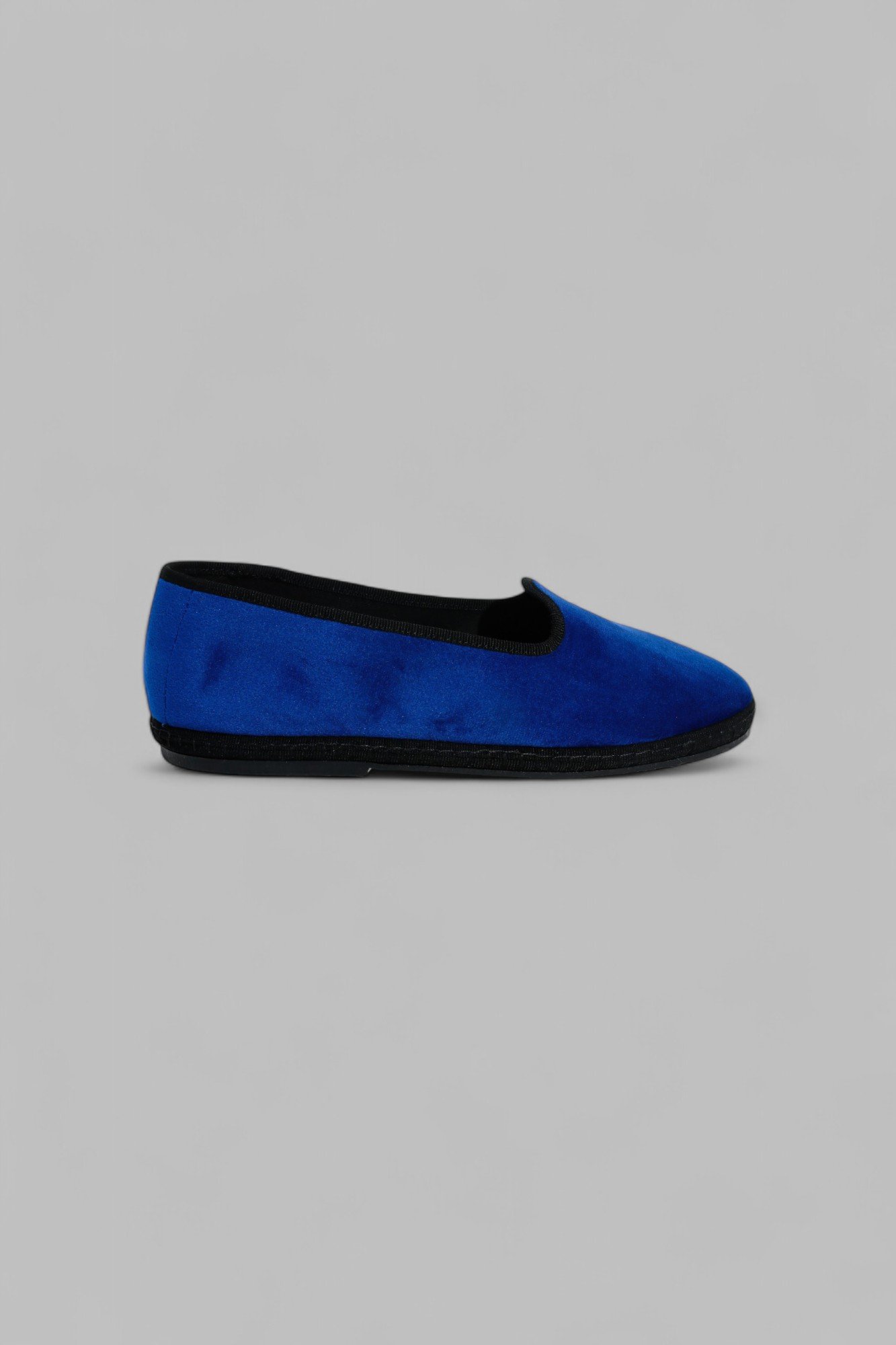 Side profile of single Gioia in Royale slipper in sapphire blue
