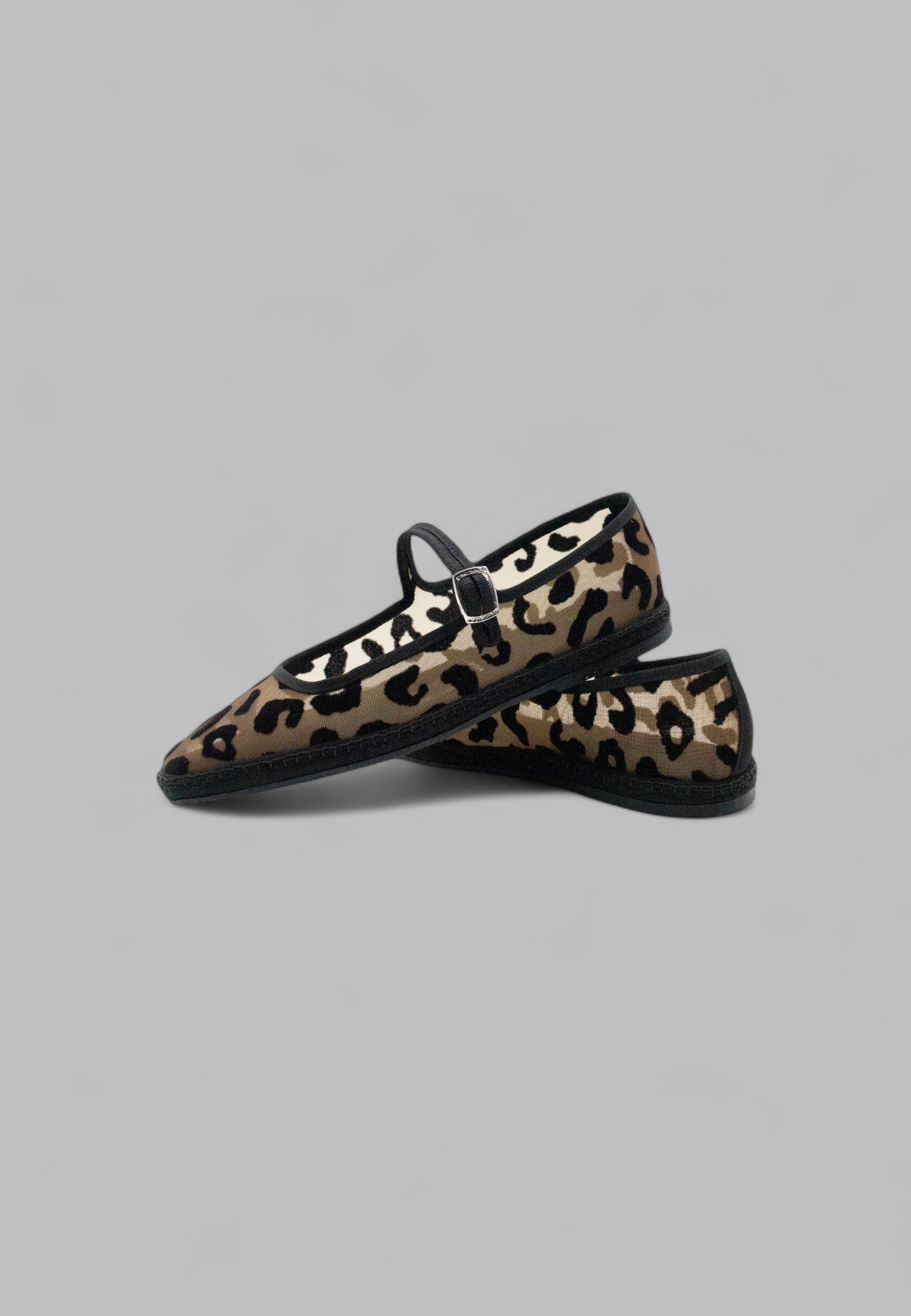 Overlapped pair of Aria jaguar print mesh Mary Jane slippers