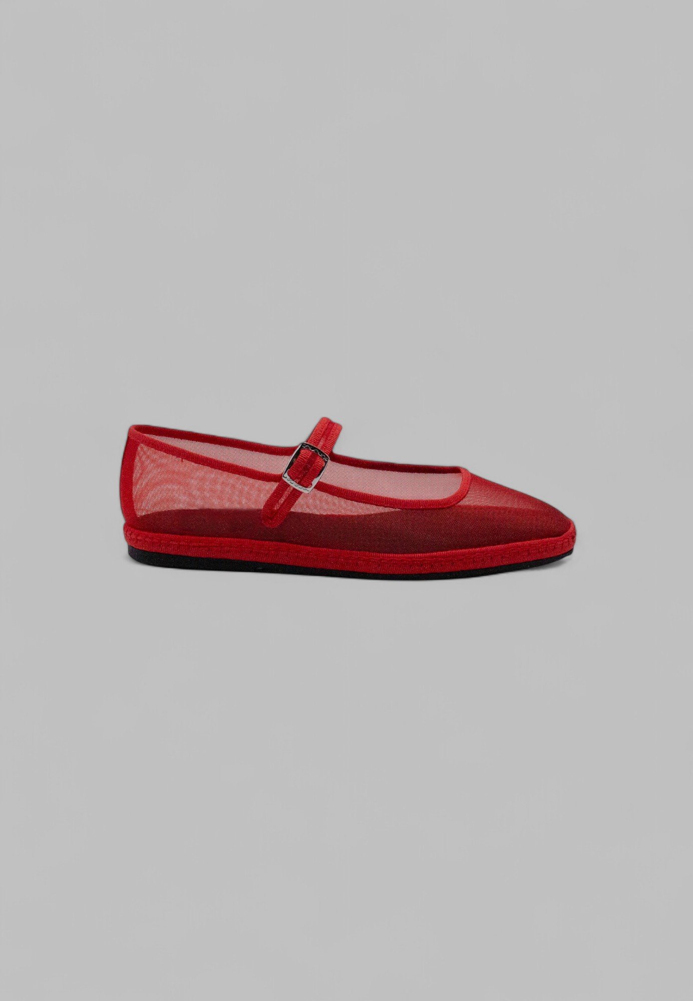 Side view of handmade flame-red mesh Mary Jane Friulana flat