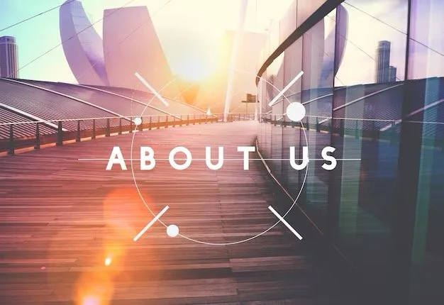 Wooden bridge with "About Us" text overlay, modern cityscape background, sunset lighting.