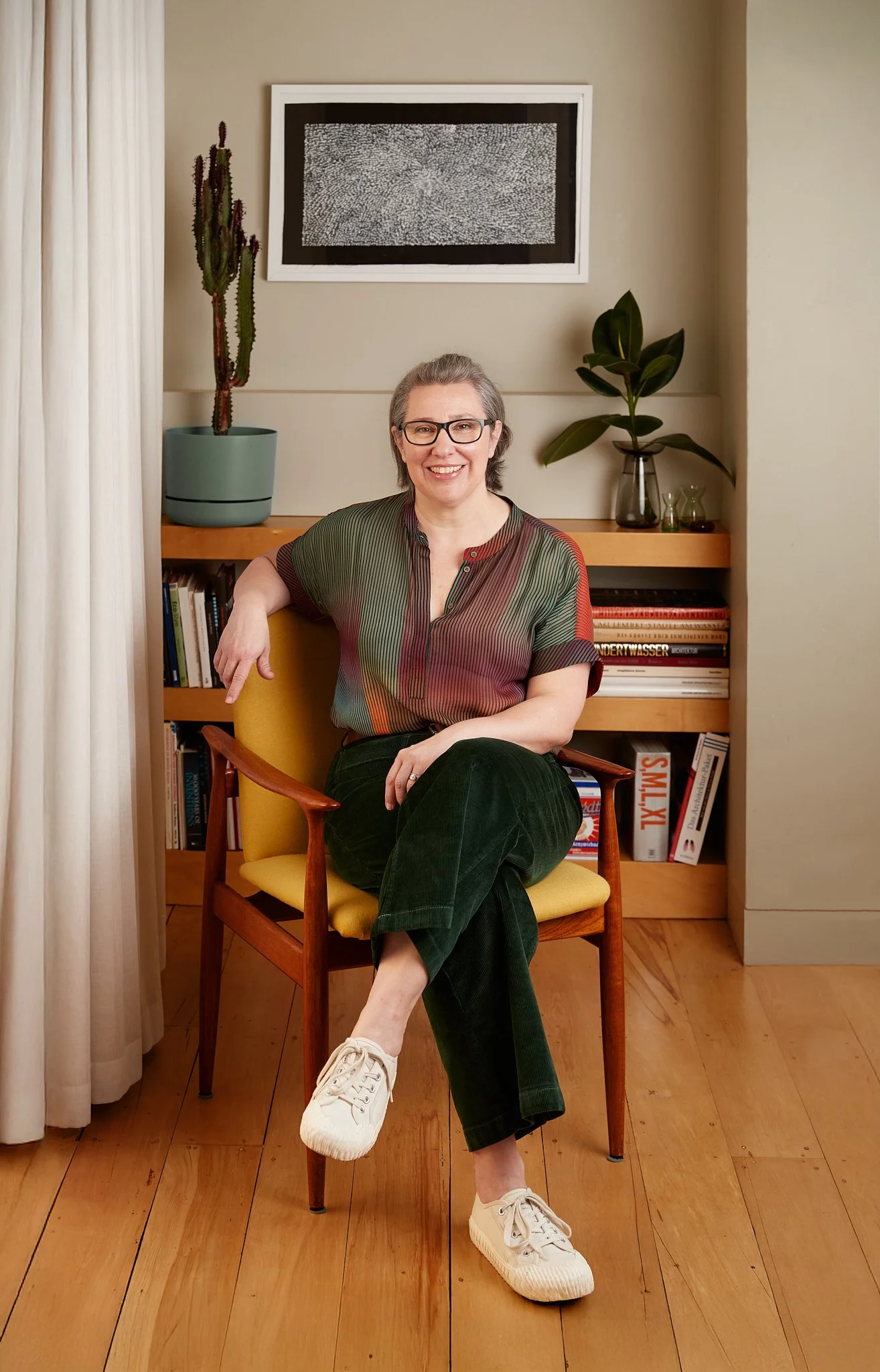 Alex Ansari seated inside her architecture practice.