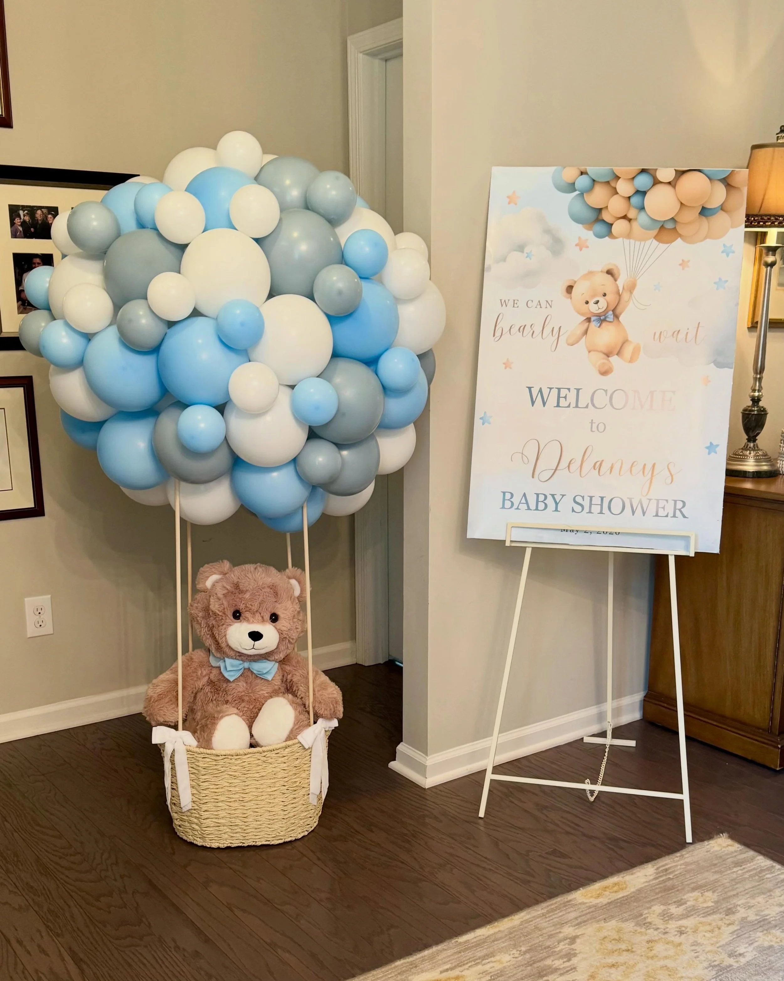 This &ldquo;We Can Bearly Wait&rdquo; setup featured a custom hot air balloon installation with teddy bear details. The personalized welcome sign made the perfect statement piece for guests as they arrived. 🩵🧸☁️