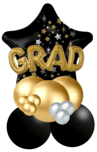 Graduation-themed balloons with a black star balloon labeled "GRAD" in gold letters, surrounded by gold, silver, and black round balloons.