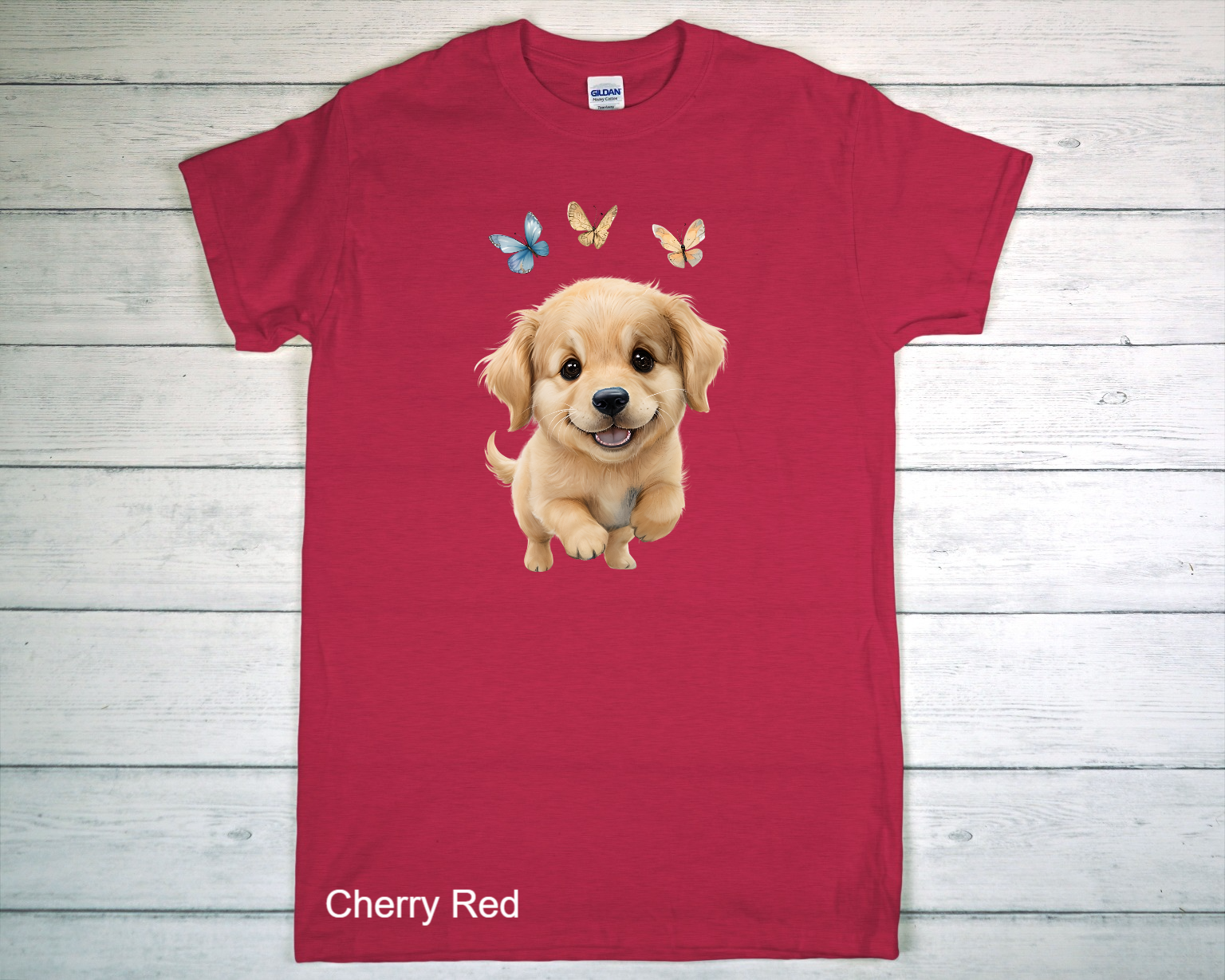 Red Short-Sleeved T-Shirt Laid Flat On Weathered Planks.png