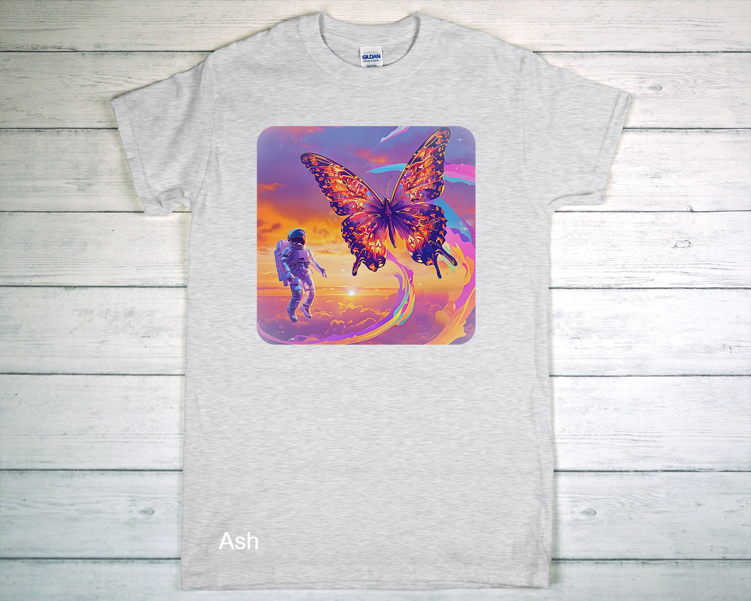 Light Gray Gildan T-Shirt Laid Flat On Wooden Surface.png