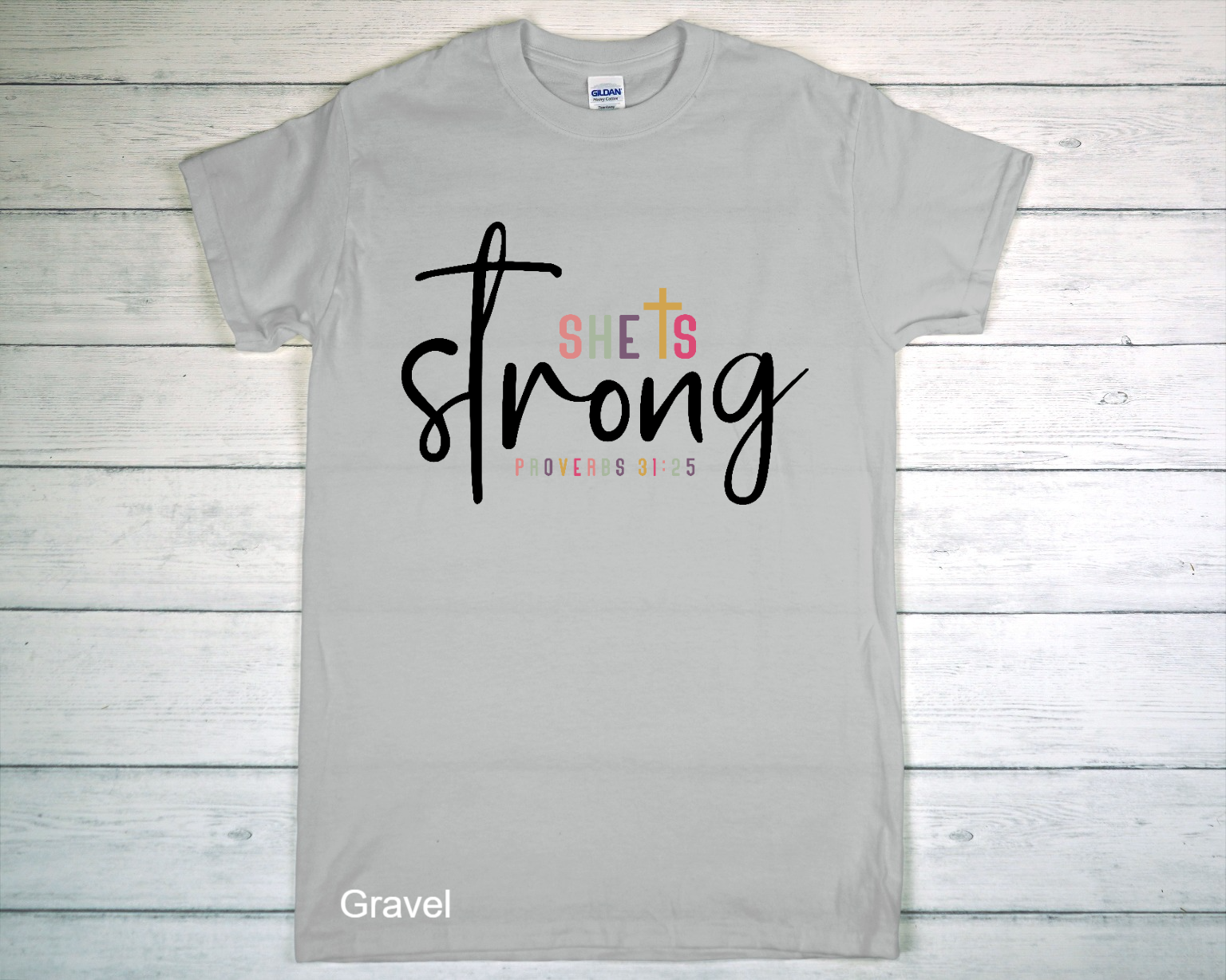 Light Gray Gildan T-Shirt On Whitewashed Wooden Surface.png
