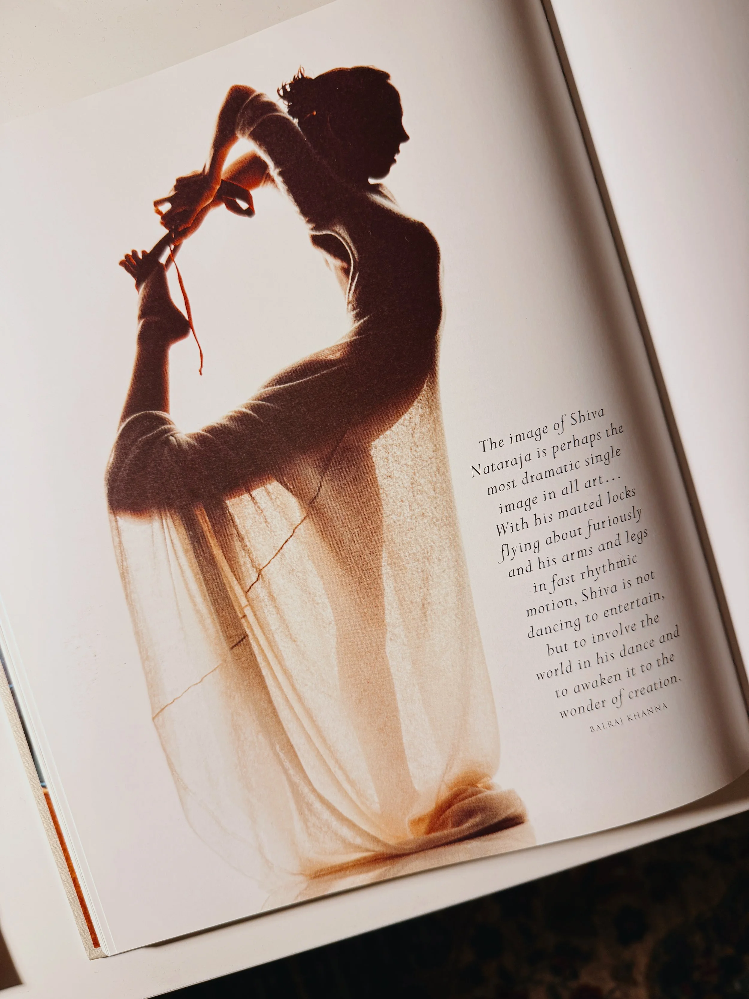 Silhouette of a person performing a dance pose, holding their foot with one hand, with text about Shiva Nataraja on the right.