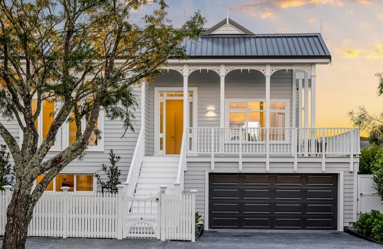 Renovated Auckland villa at dusk by Key Interiors