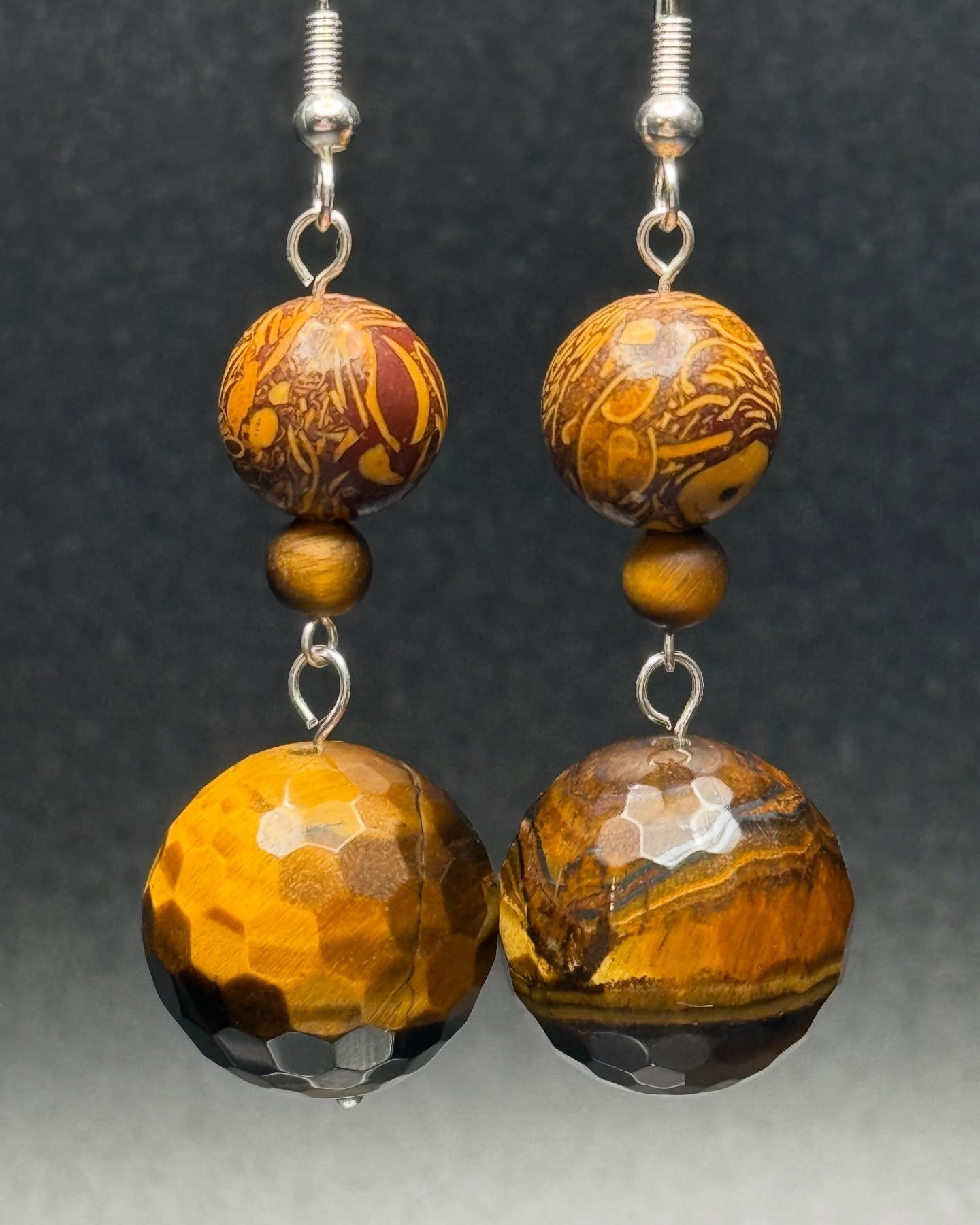 Miriam stone has many names: calligraphy stone, elephant skin jasper, and Arabic stone. No matter what your preference, it&rsquo;s hard to believe that natural swirling patterns happen in nature. 💛 🤎 💛 #calligraphy #jasper #tigerseye