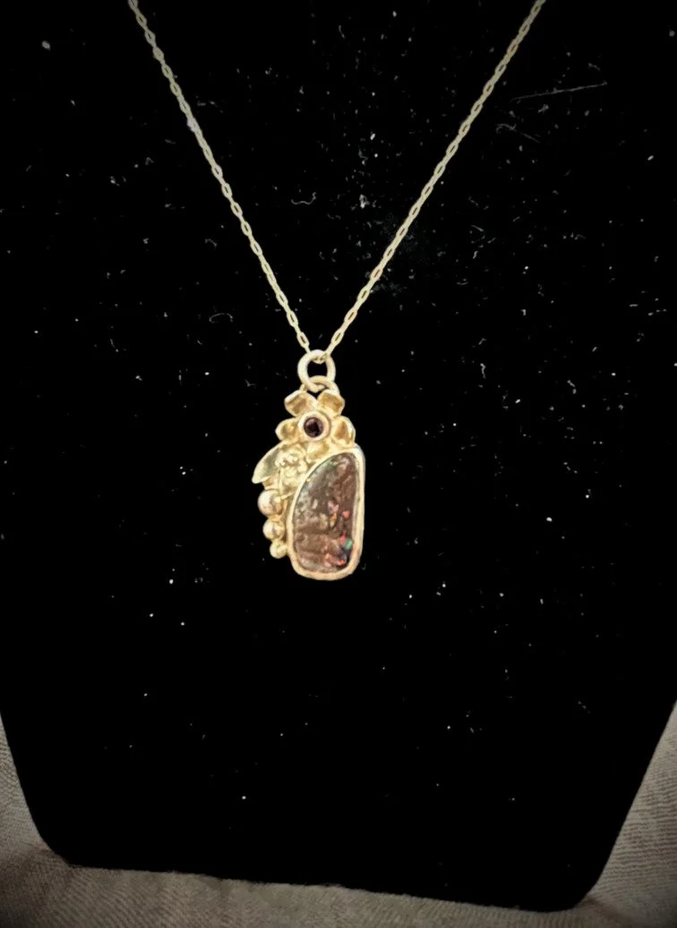 Aurora Gage_Boulder Opal and Garnet Flower Pendant.jpg