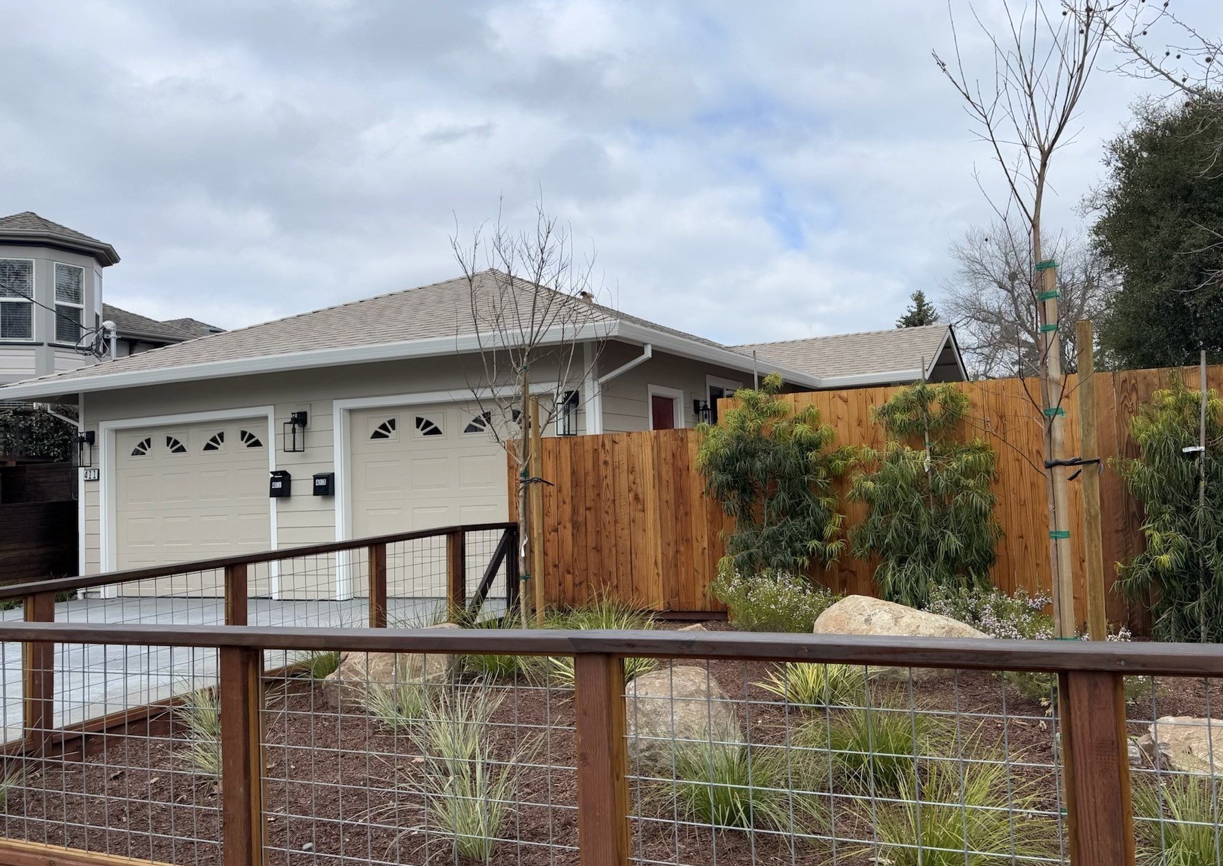 Drought-tolerant front yard with native plants, gravel pathways, and water-efficient landscaping – designed by Novara Landscape in Marin County
