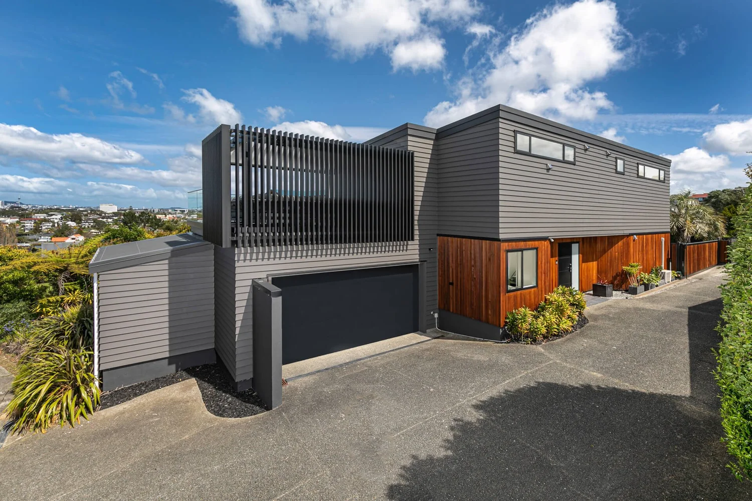Exterior house painting, modern Auckland home