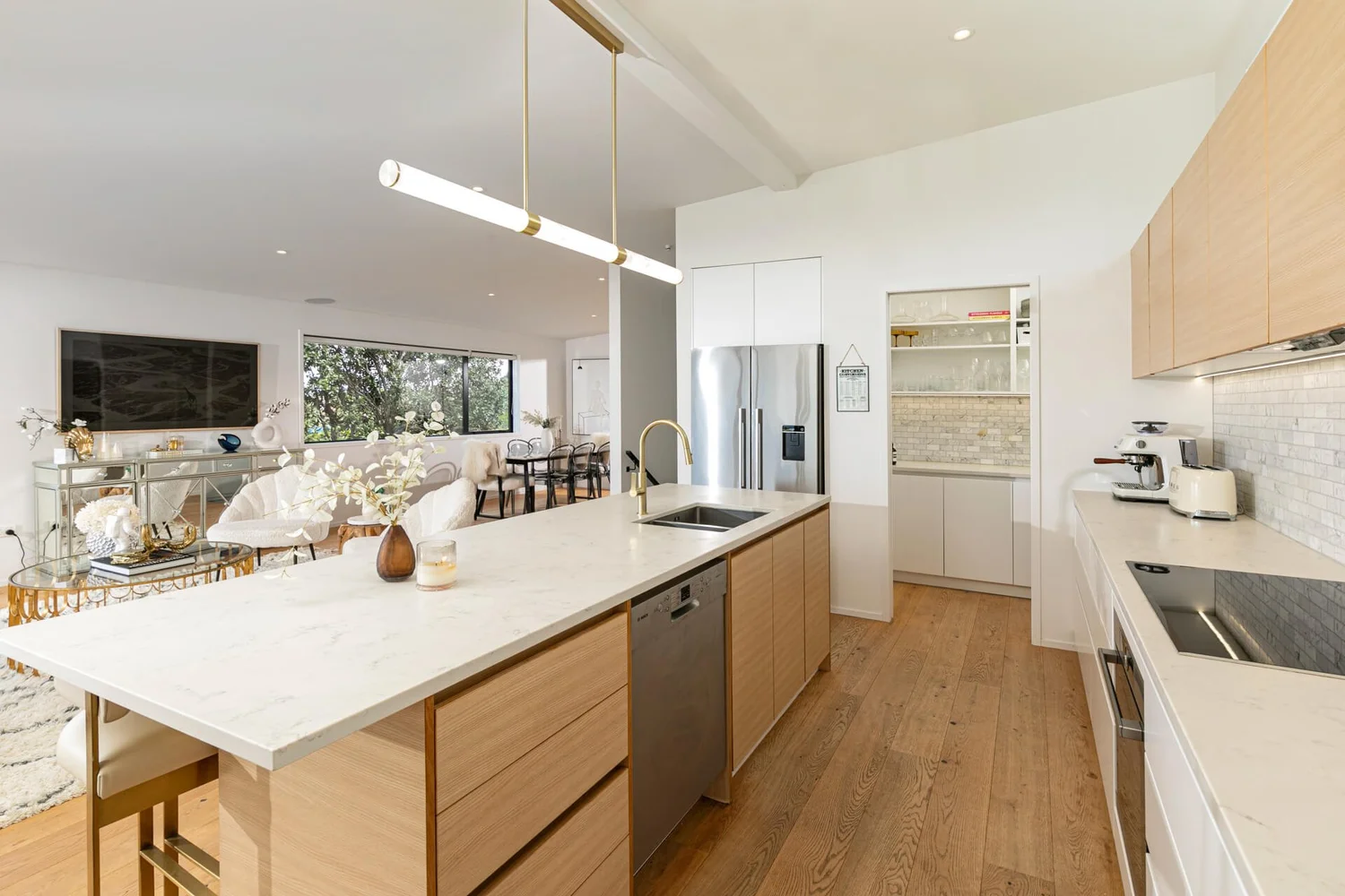 Freshly painted open-plan kitchen and dining interior, Auckland