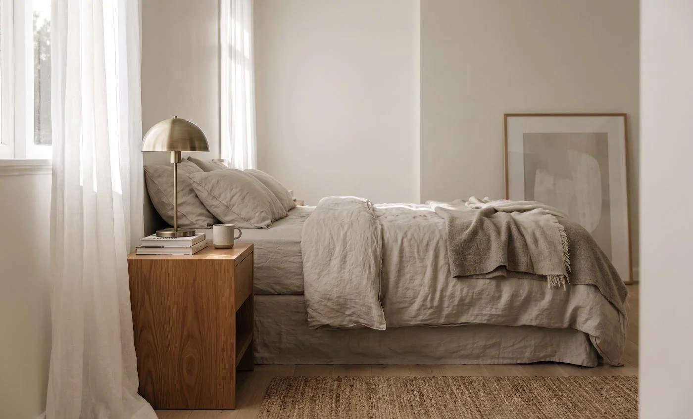 Small Auckland bedroom painted in a soft warm off-white that makes the room feel larger and brighter