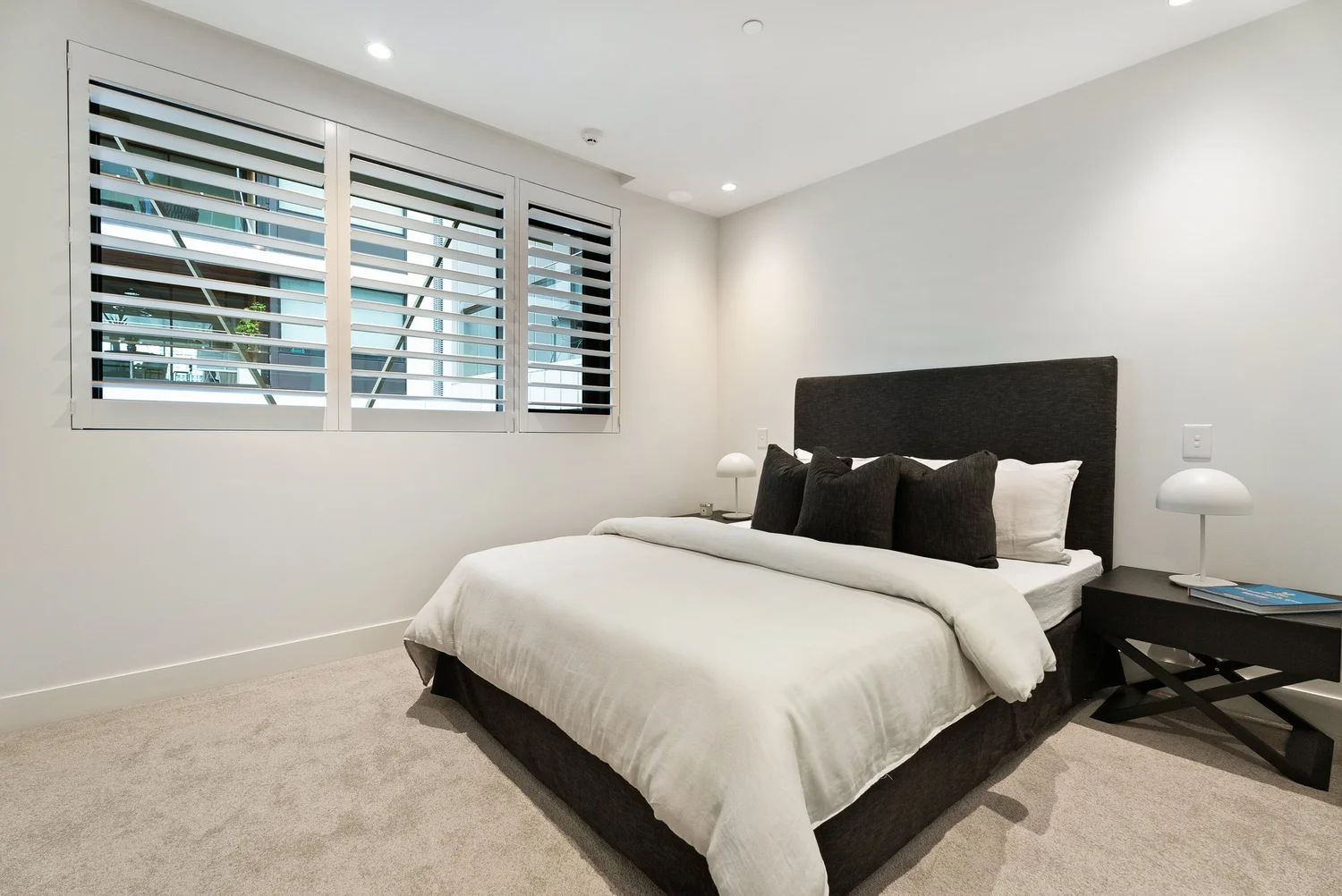 Repainted modern bedroom with crisp white walls, Auckland