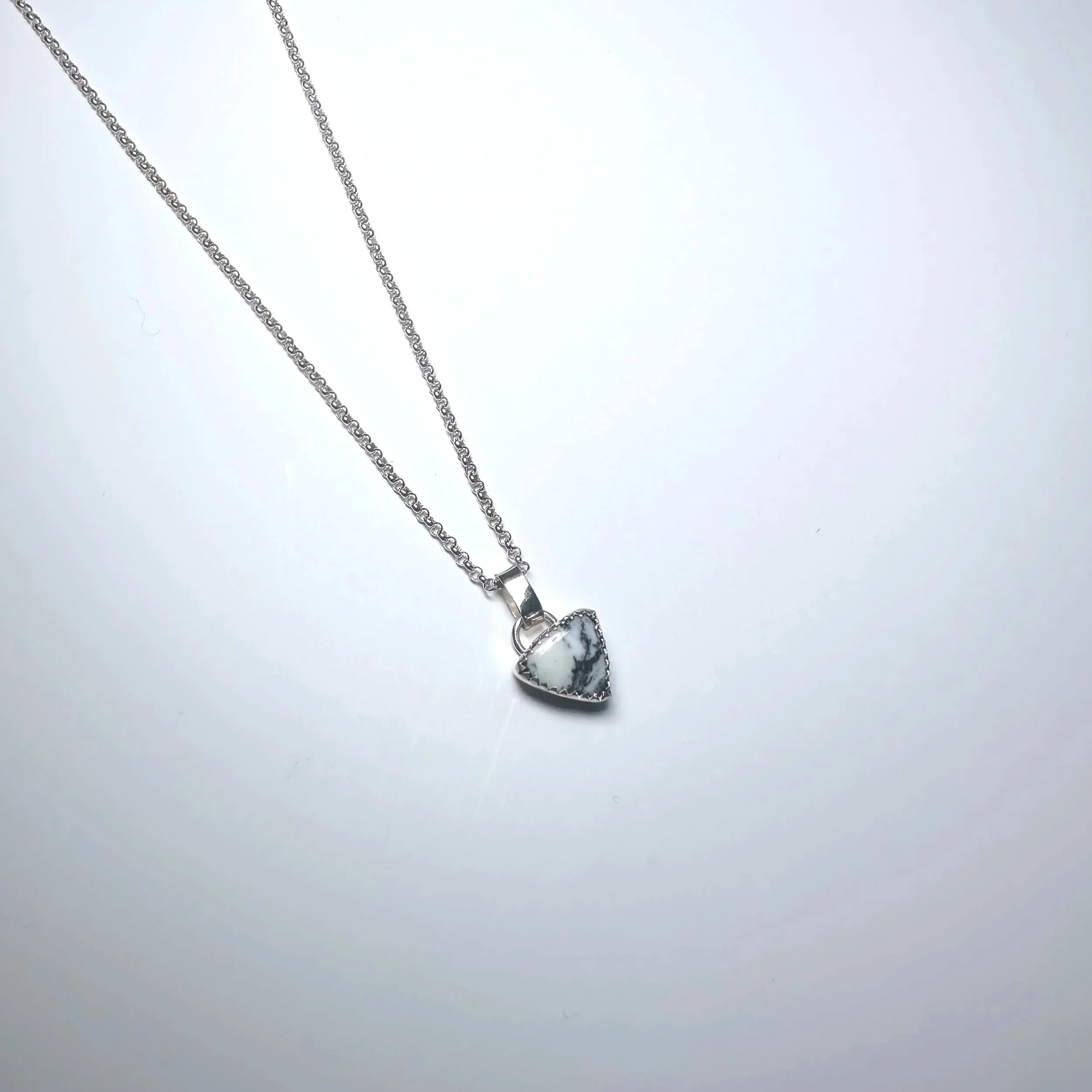 White Buffalo Triangle Pendant