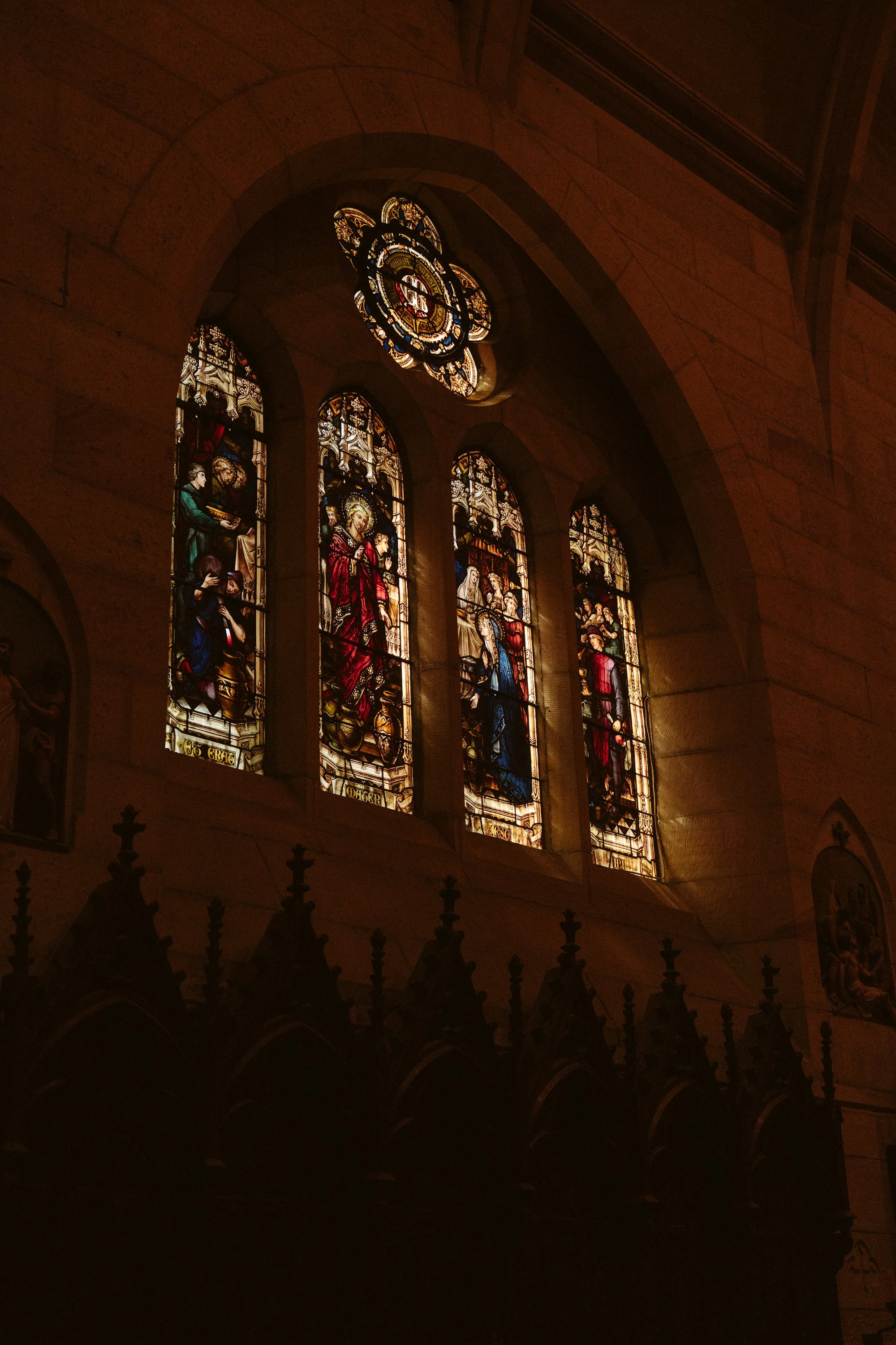 Stained glass windows inside a church.