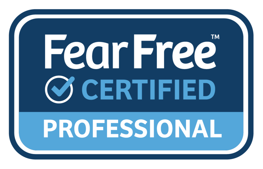 A badge with blue and white colors that reads 'Fear Free Certified Professional' indicating certification for pet care professionals.