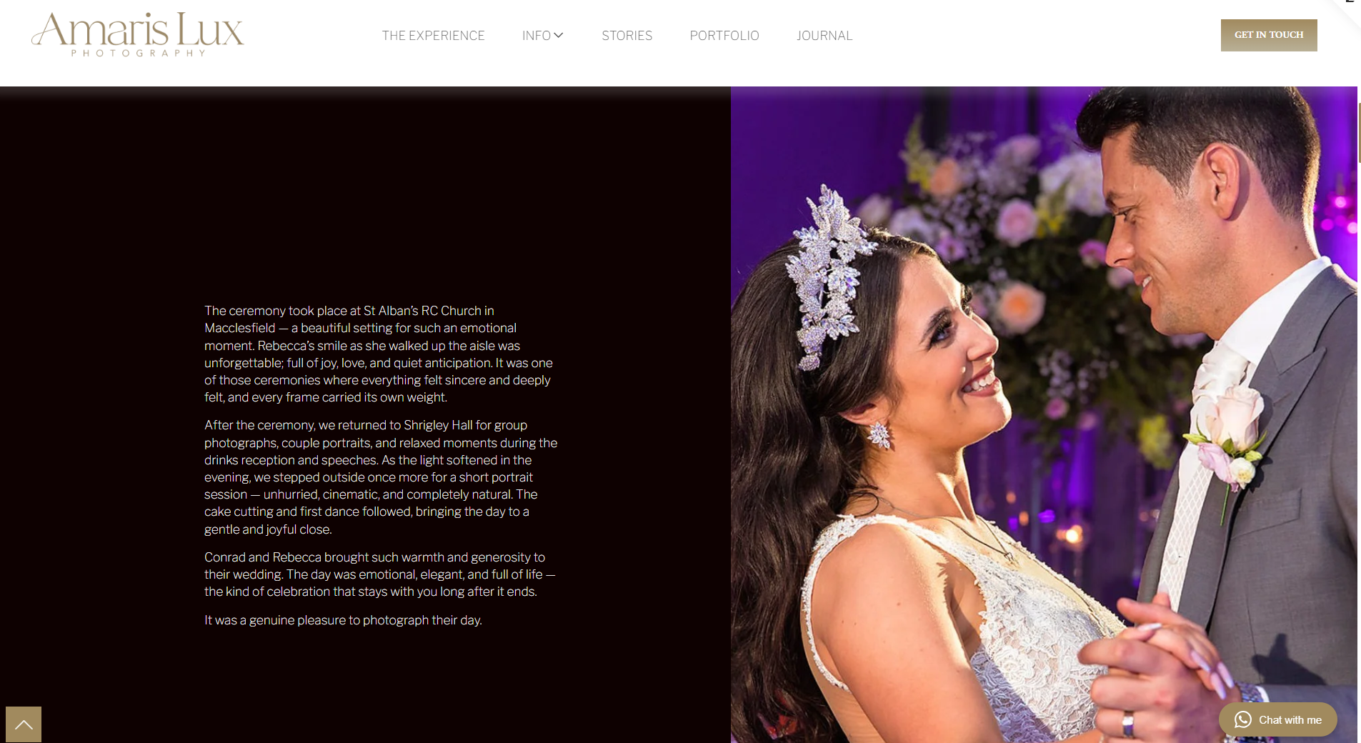 A bride and groom sharing a dance at their wedding reception, smiling at each other, with a floral backdrop.