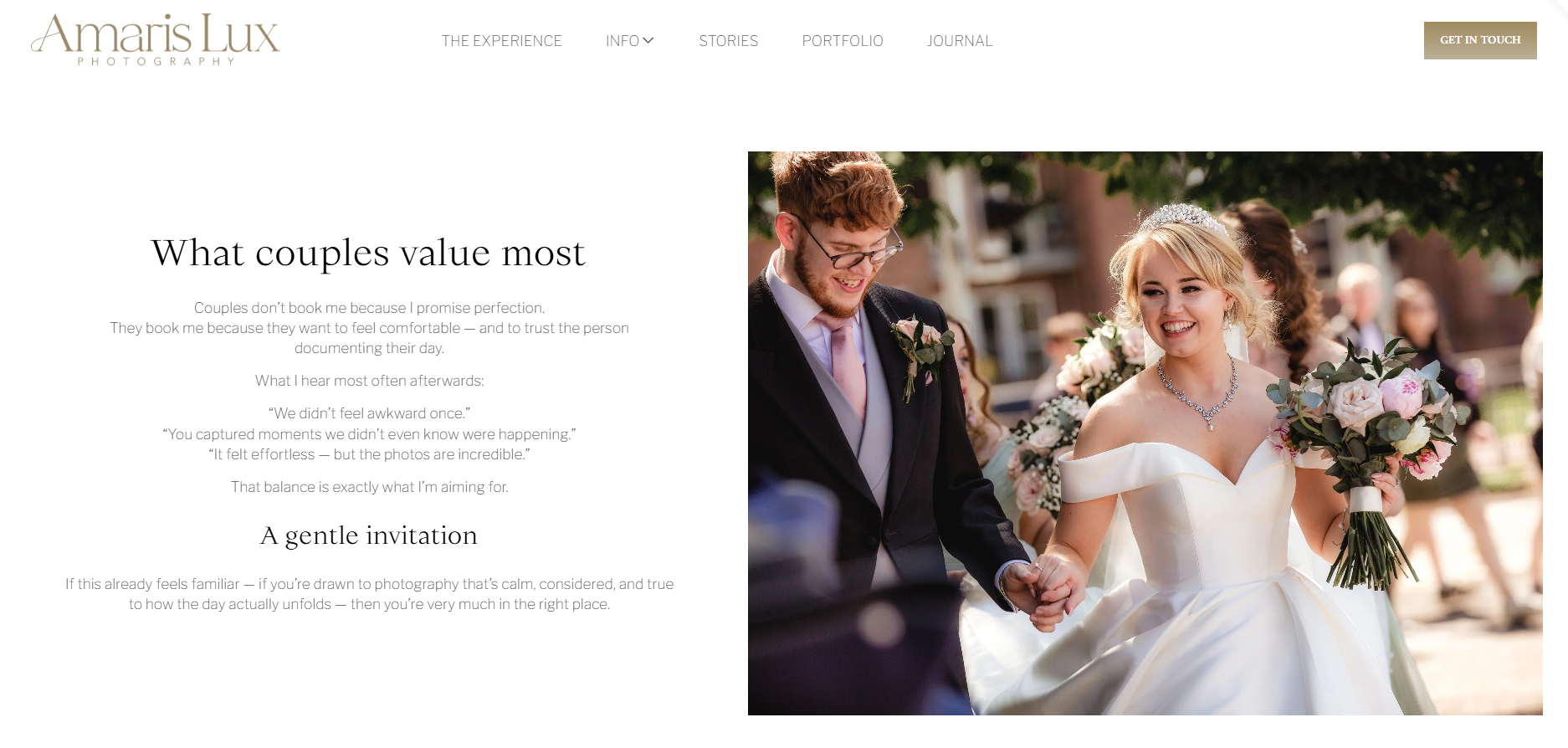 A smiling bride and groom holding hands during their wedding ceremony outdoors, surrounded by guests and greenery.