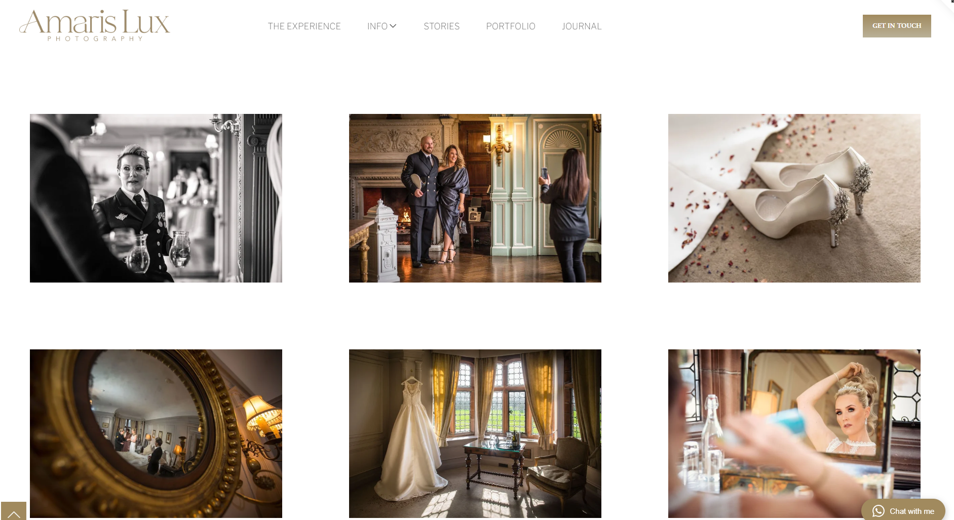 A website gallery page from Amaris Lux Photography displaying wedding-related images. The images include a black and white photo of a woman in a uniform, a couple posing for photos indoors, white wedding shoes on a carpet, a bridal gown hanging in a room, a woman applying makeup at a vanity, and a man and woman looking at a mirror. The website has a navigation menu at the top with options for 'The Experience,' 'Info,' 'Stories,' 'Portfolio,' 'Journal,' and a 'Get in Touch' button.