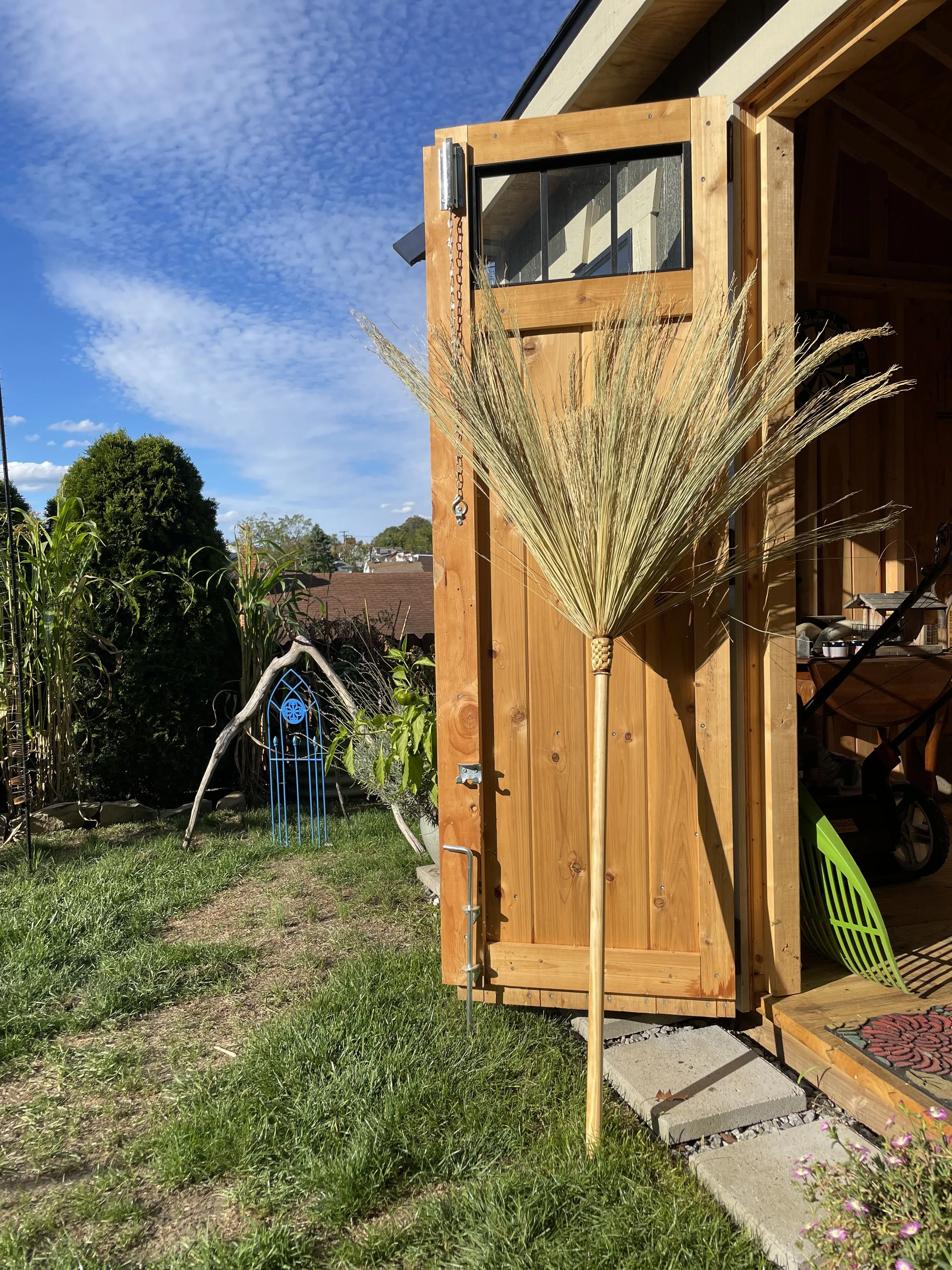 Broom drying out in the woods traditional craft hand made slow