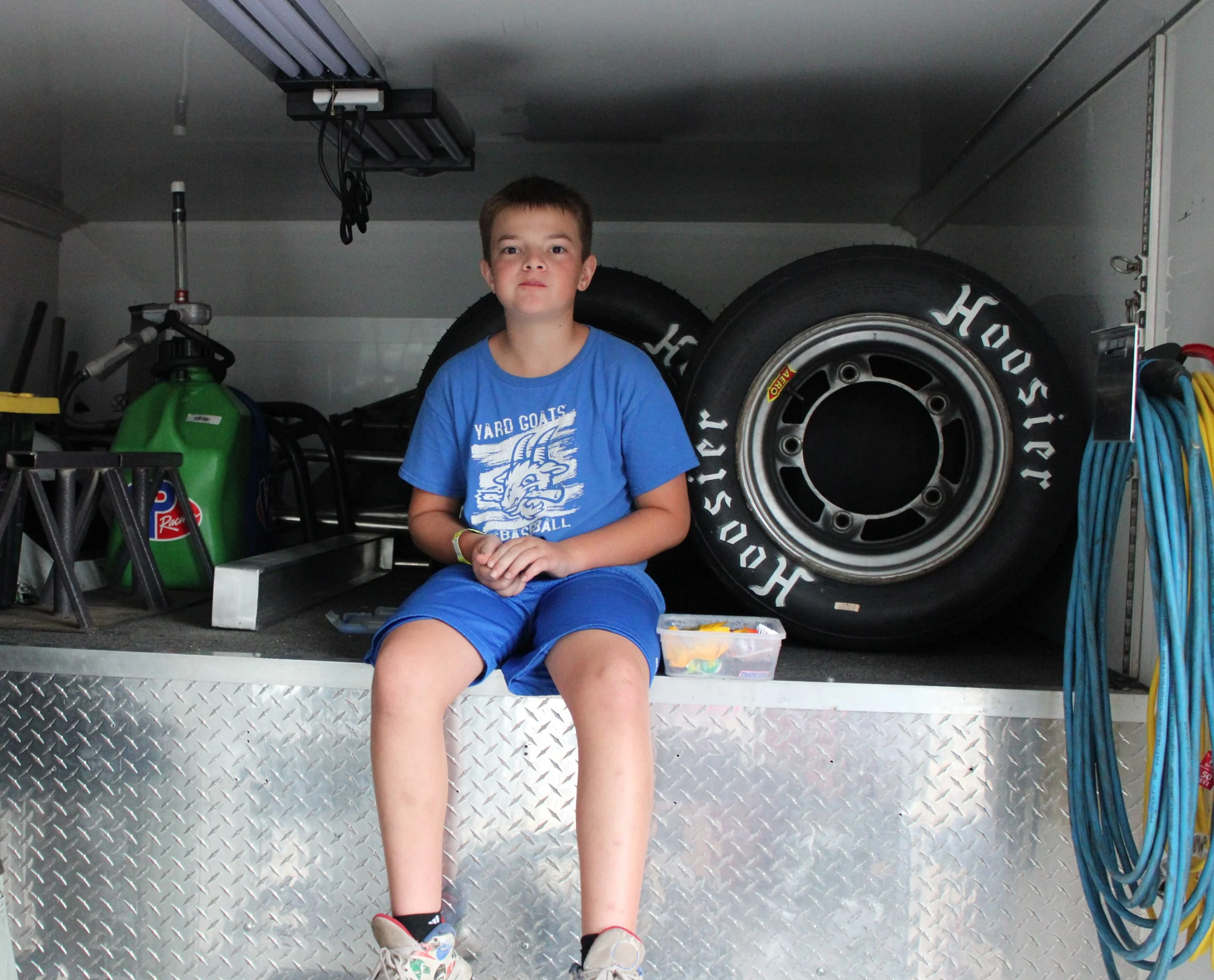 Our unofficial Junior Pit Crew Member, Kyle, making sure the crew's candy supply stayed race-ready all evening. Some jobs are just as important as the others! 🍬😄