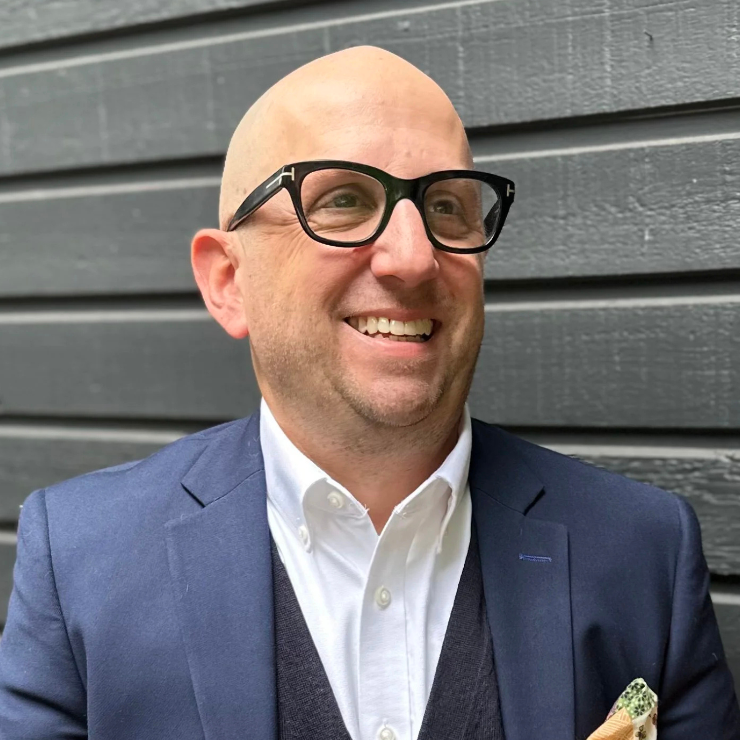 man smiling, featured in testimonial about The Greater Sum Foundation program